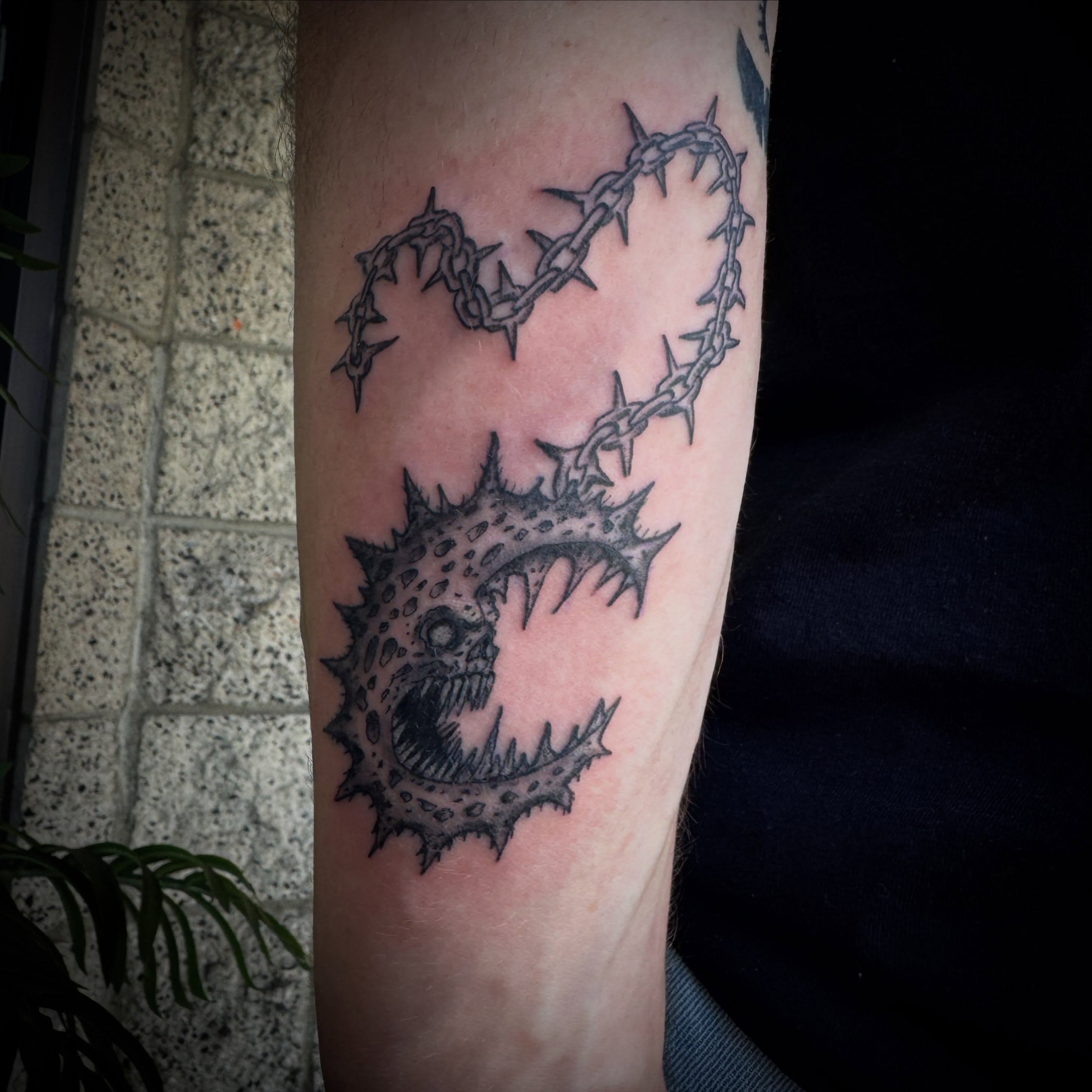 Barbed wire heart black and grey tattoo on the forearm by LeLe