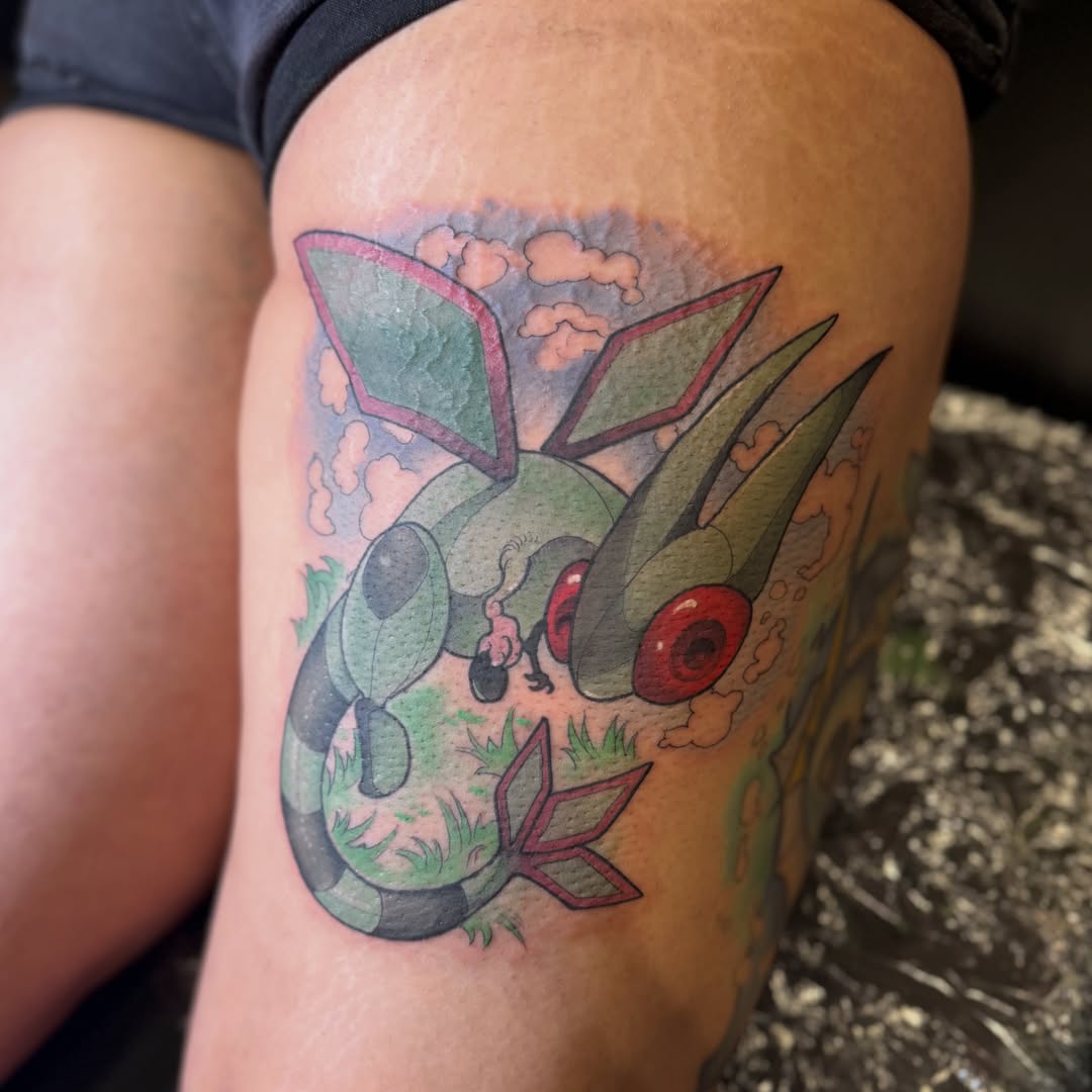 Eevee dotwork tattoo on the thigh by Nathan Evans