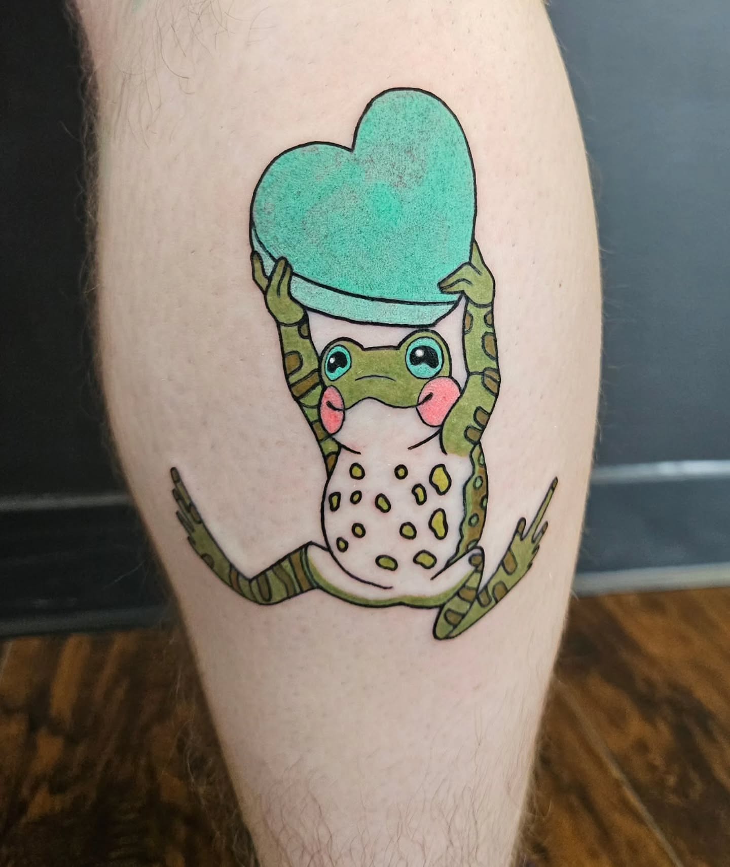 Frog with heart dotwork tattoo on the thigh by Gray
