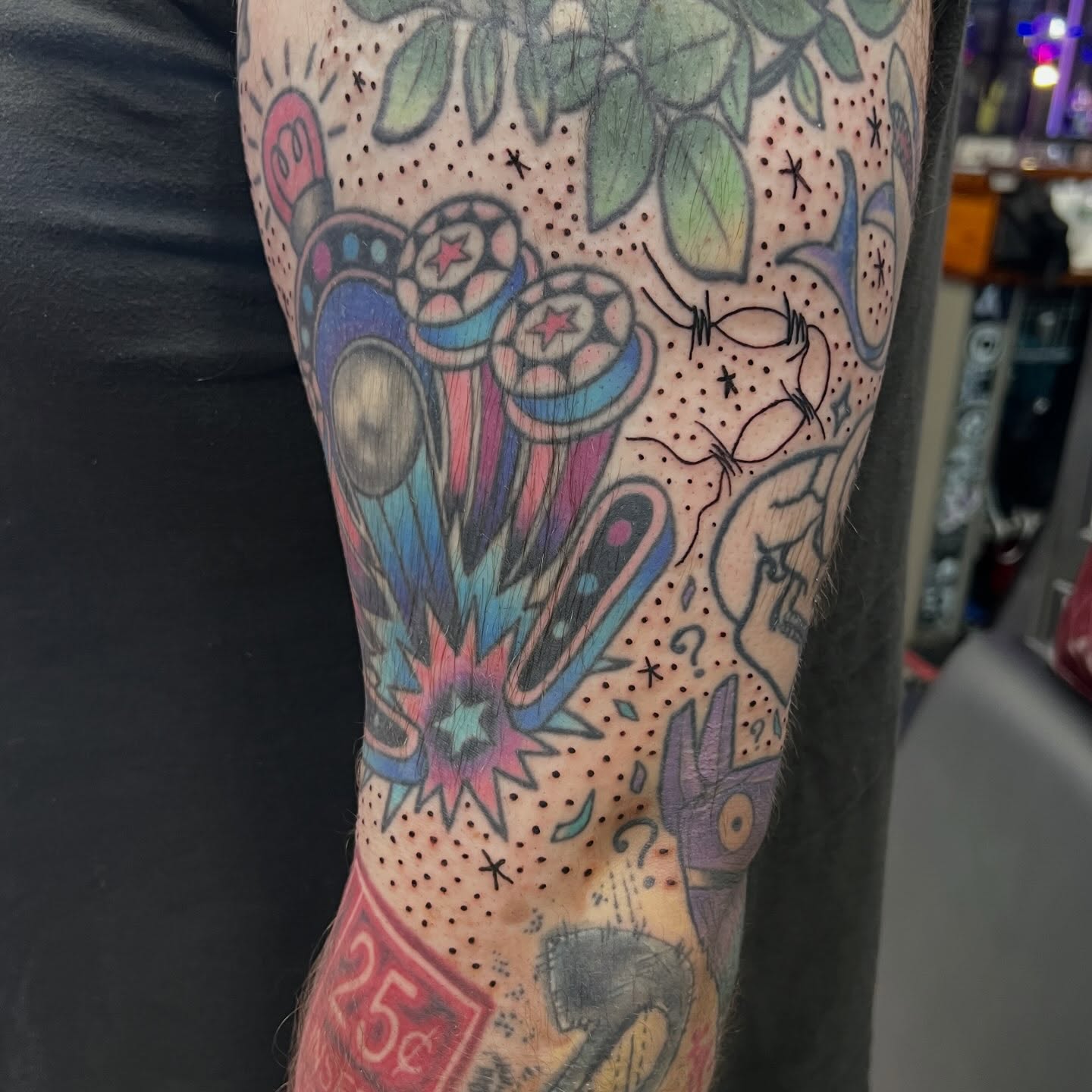 Abstract floral and geometric design dotwork tattoo on the forearm by Tomfoolery