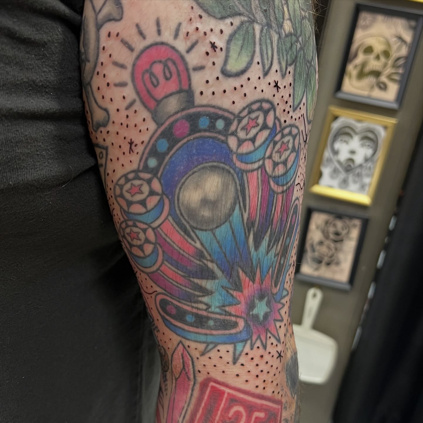 Astronaut helmet dotwork tattoo on the forearm by Tomfoolery