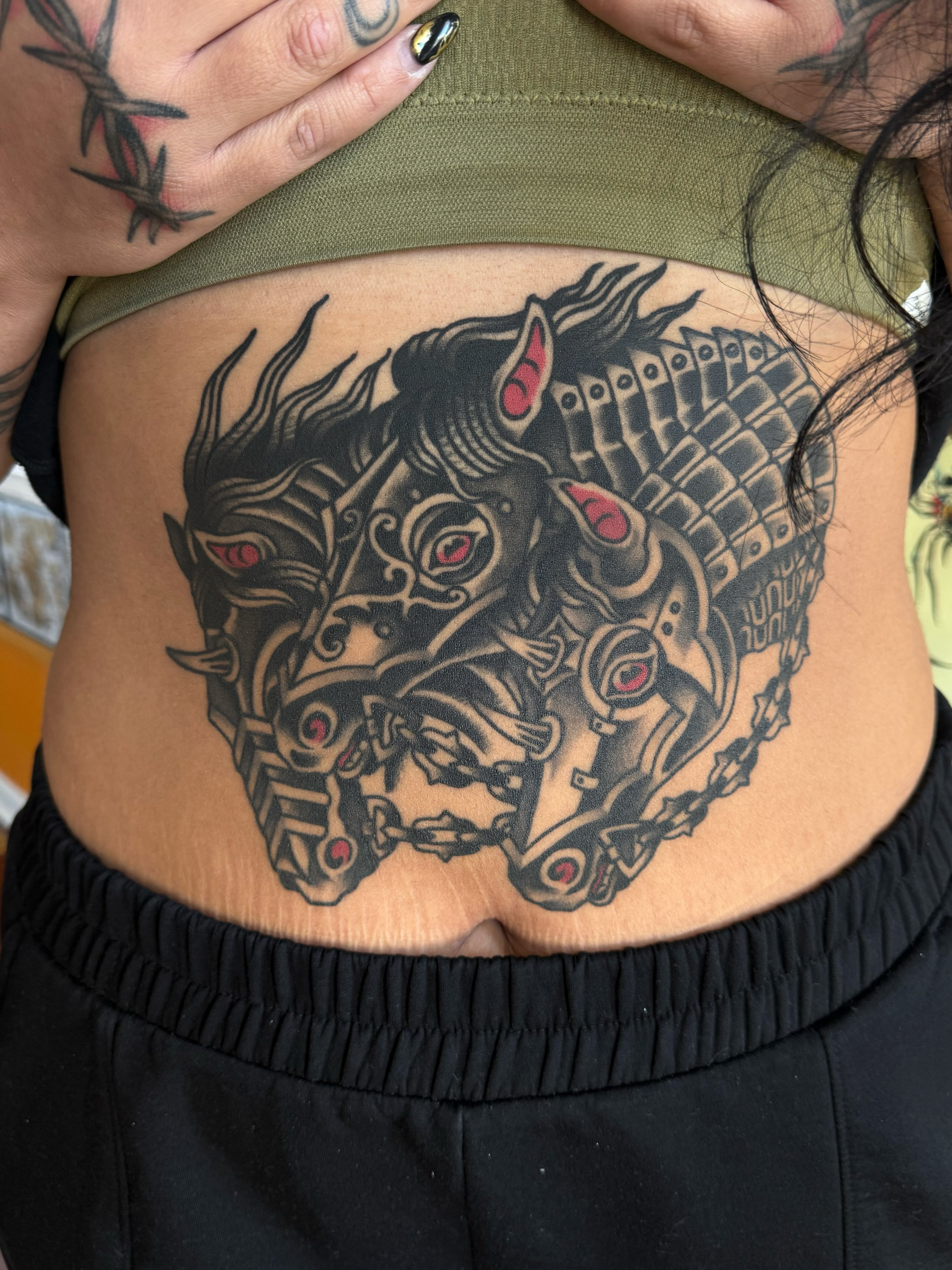 Mask black and grey tattoo on the torso by ༺tessa༻