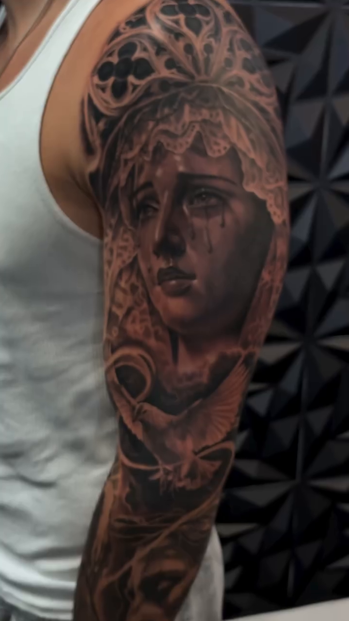 Tattoo by @tovar_tattoos — realism, black_and_grey