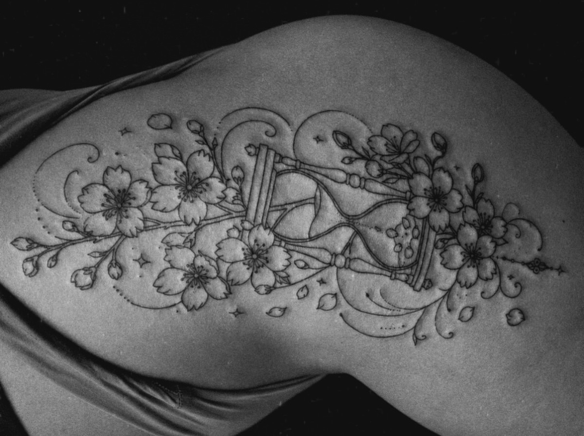 Cherry blossoms and violin fine line tattoo on the shoulder by Kraken ink Tattoo, San Francisco, California