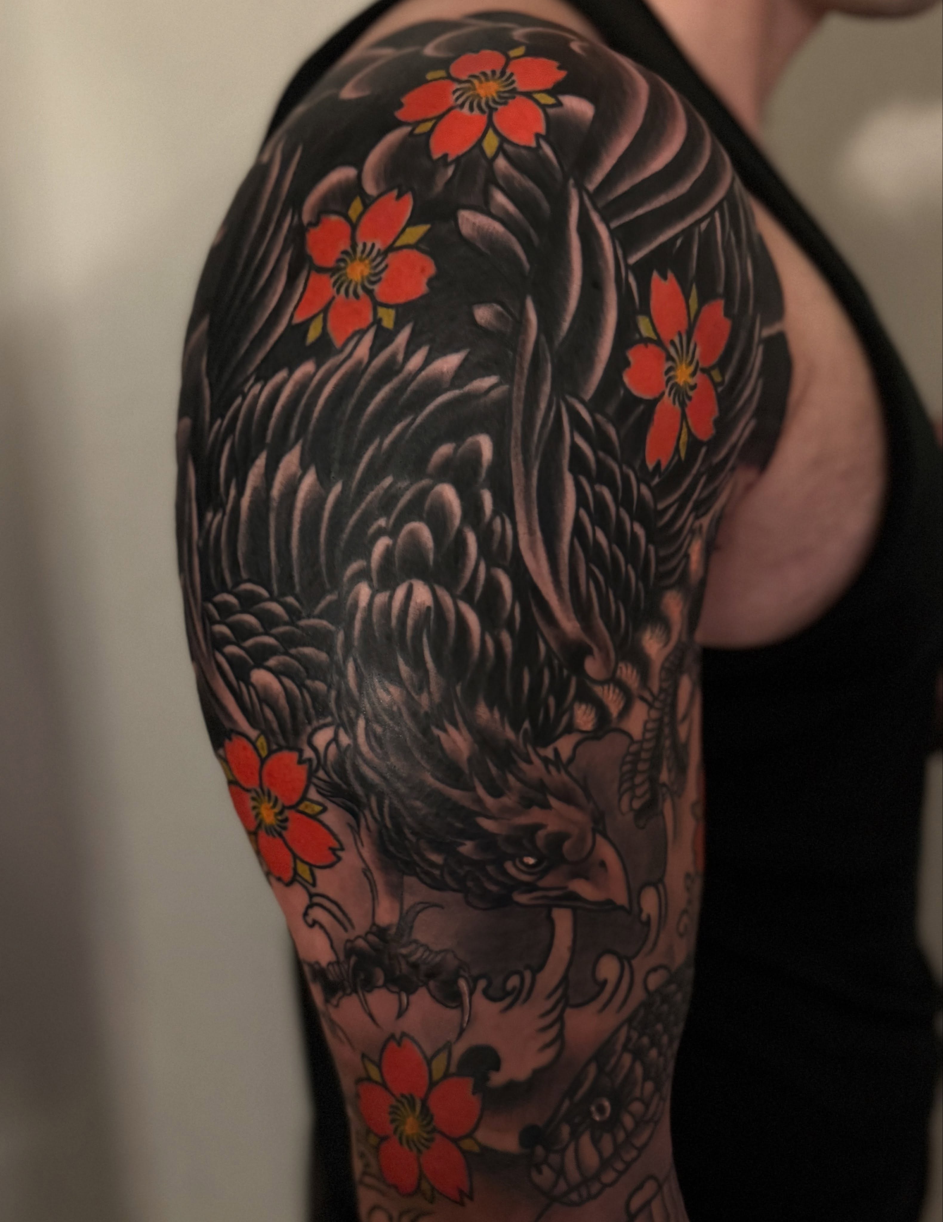 Phoenix and cherry blossoms japanese irezumi tattoo on the shoulder by Randall Croley El