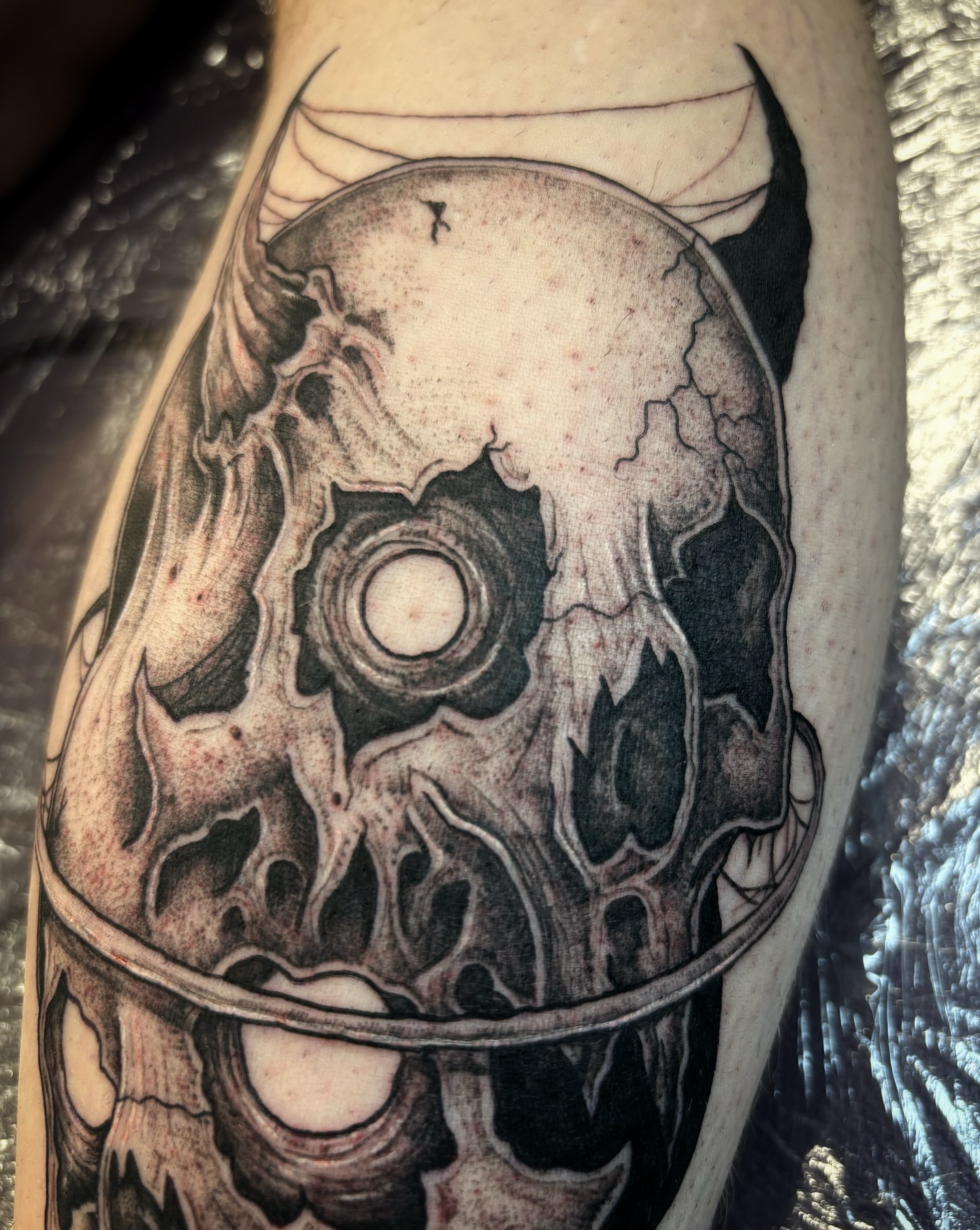 Tattoo by @scorchedbones_ — black_and_grey, realism