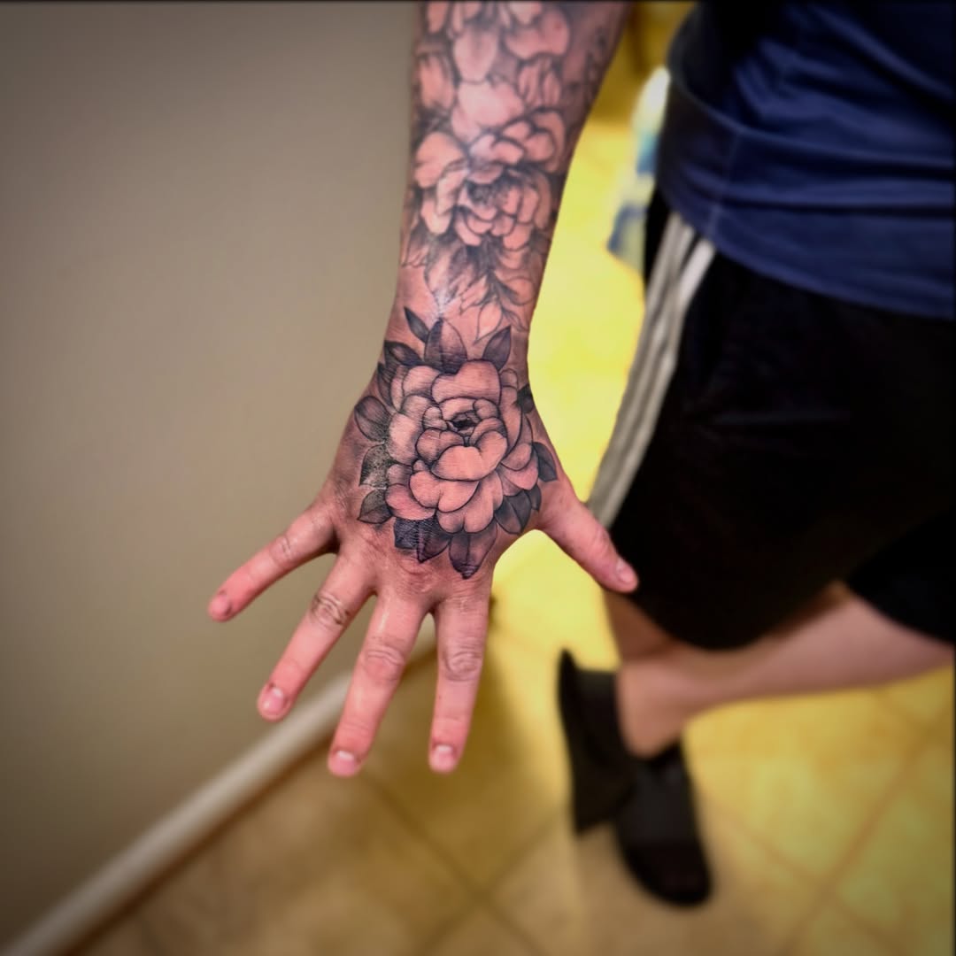 Floral black and grey tattoo on the hand by ๐ต๐๐๐๐๐๐๐ ๐ป๐๐๐๐