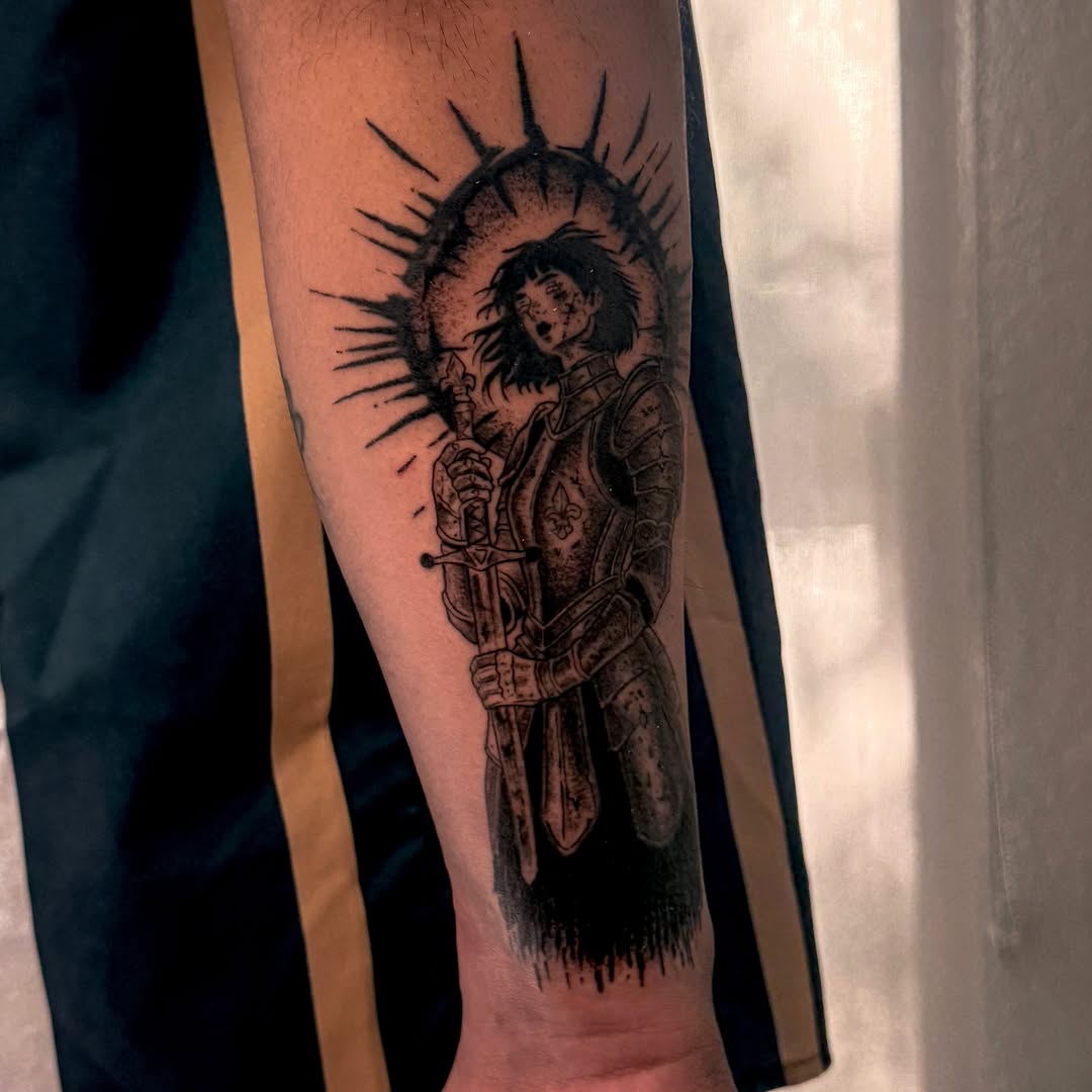 Knight with sword black and grey tattoo on the forearm by Las Vegas Tattoo Artist