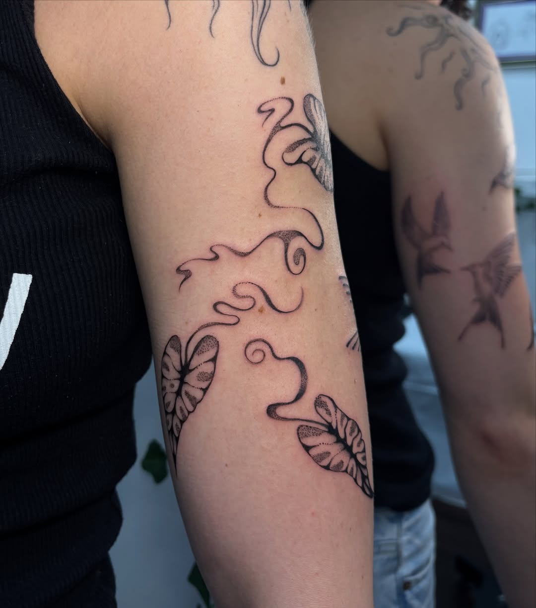 Swirls and butterflies black and grey tattoo on the forearm by ꩜ 𖦹