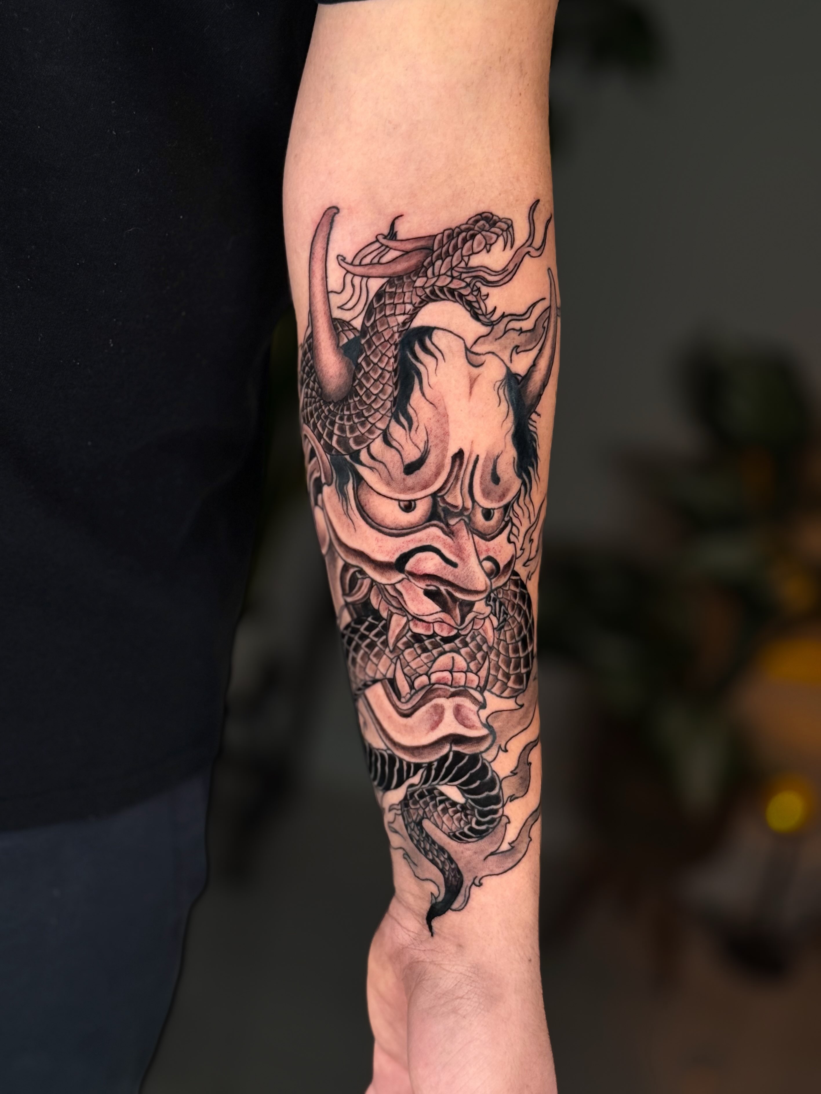 Demon mask japanese irezumi tattoo on the forearm by Kai, Charlotte, North Carolina