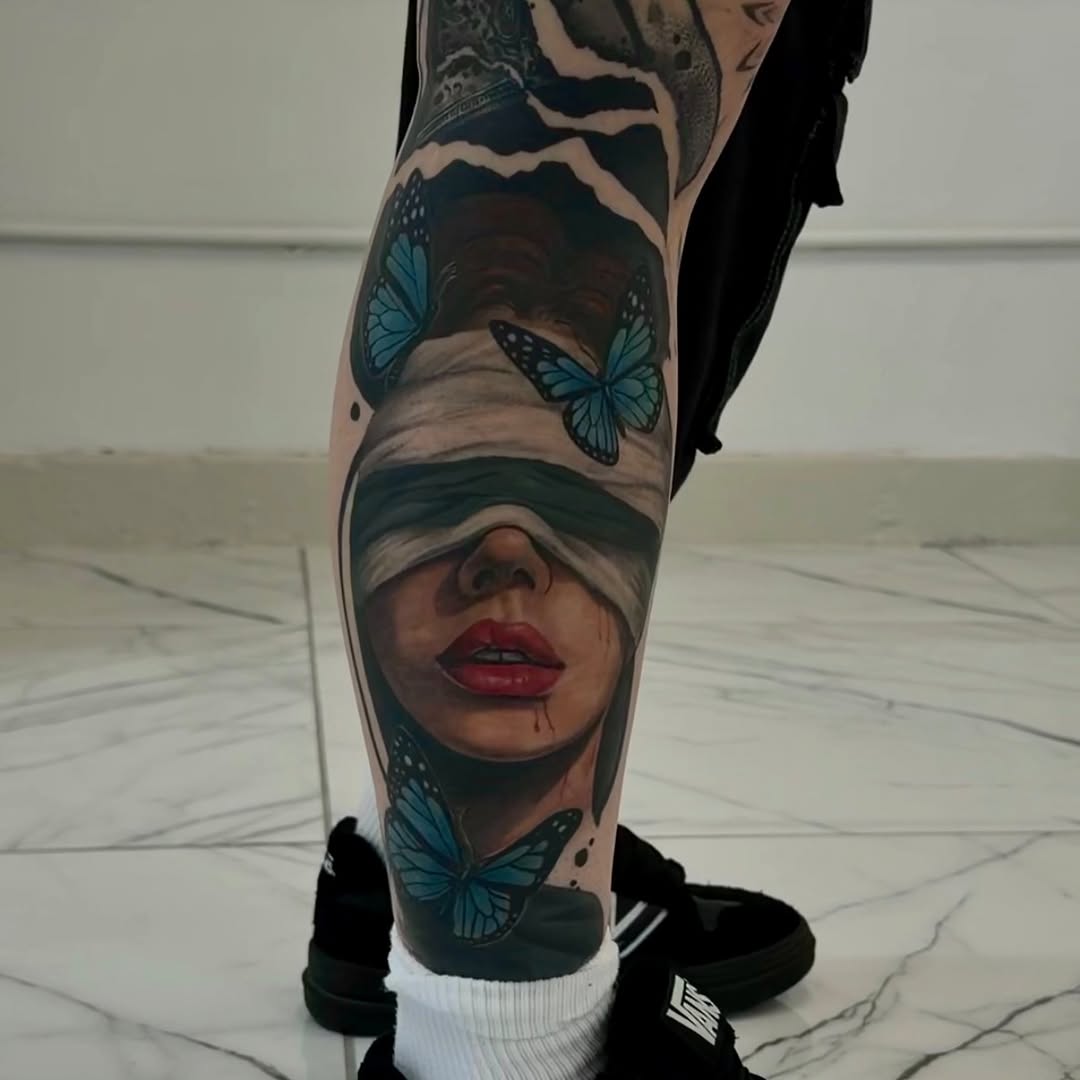 Blindfolded woman with butterflies surrealism tattoo on the forearm by ✨ Tattoo Artist