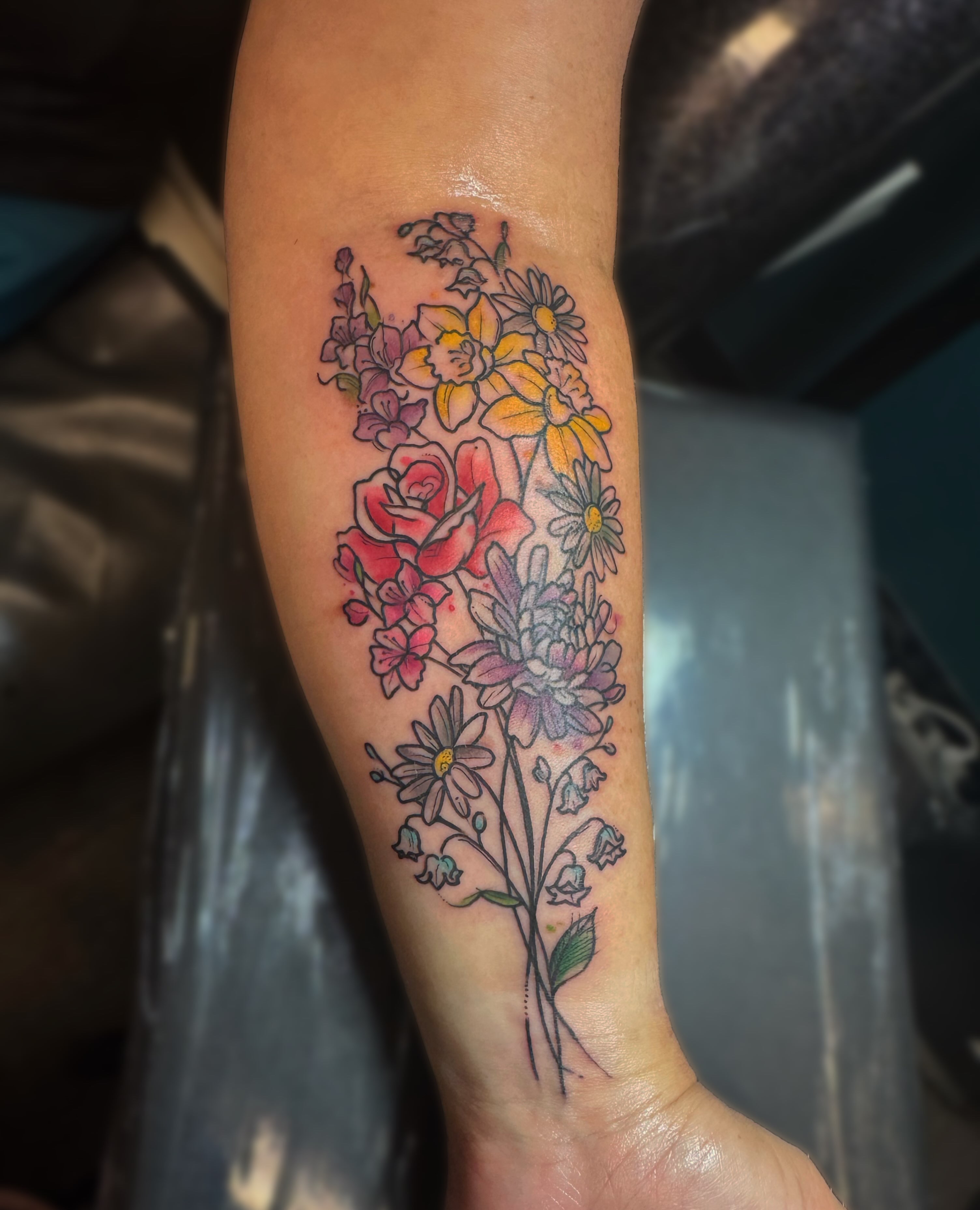 Floral bouquet new school tattoo on the forearm by Kelsey 🖤 Tattoo Artist, Waterford Township