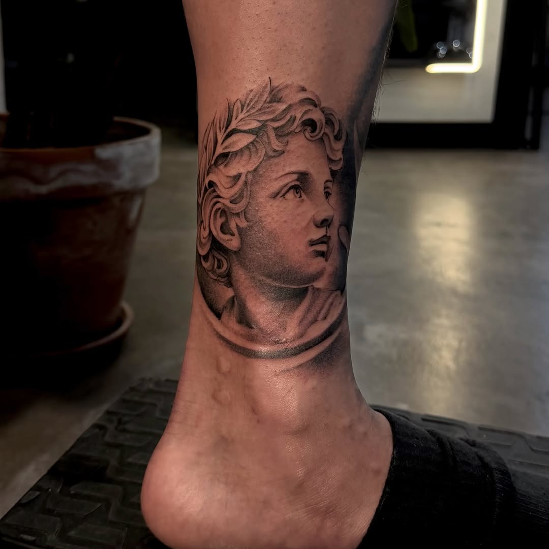 Tattoo by @joe.cruz_tattoos — realism, black_and_grey