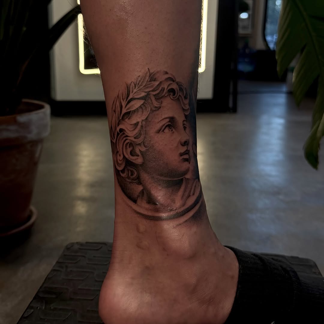 Tattoo by @joe.cruz_tattoos — realism, black_and_grey