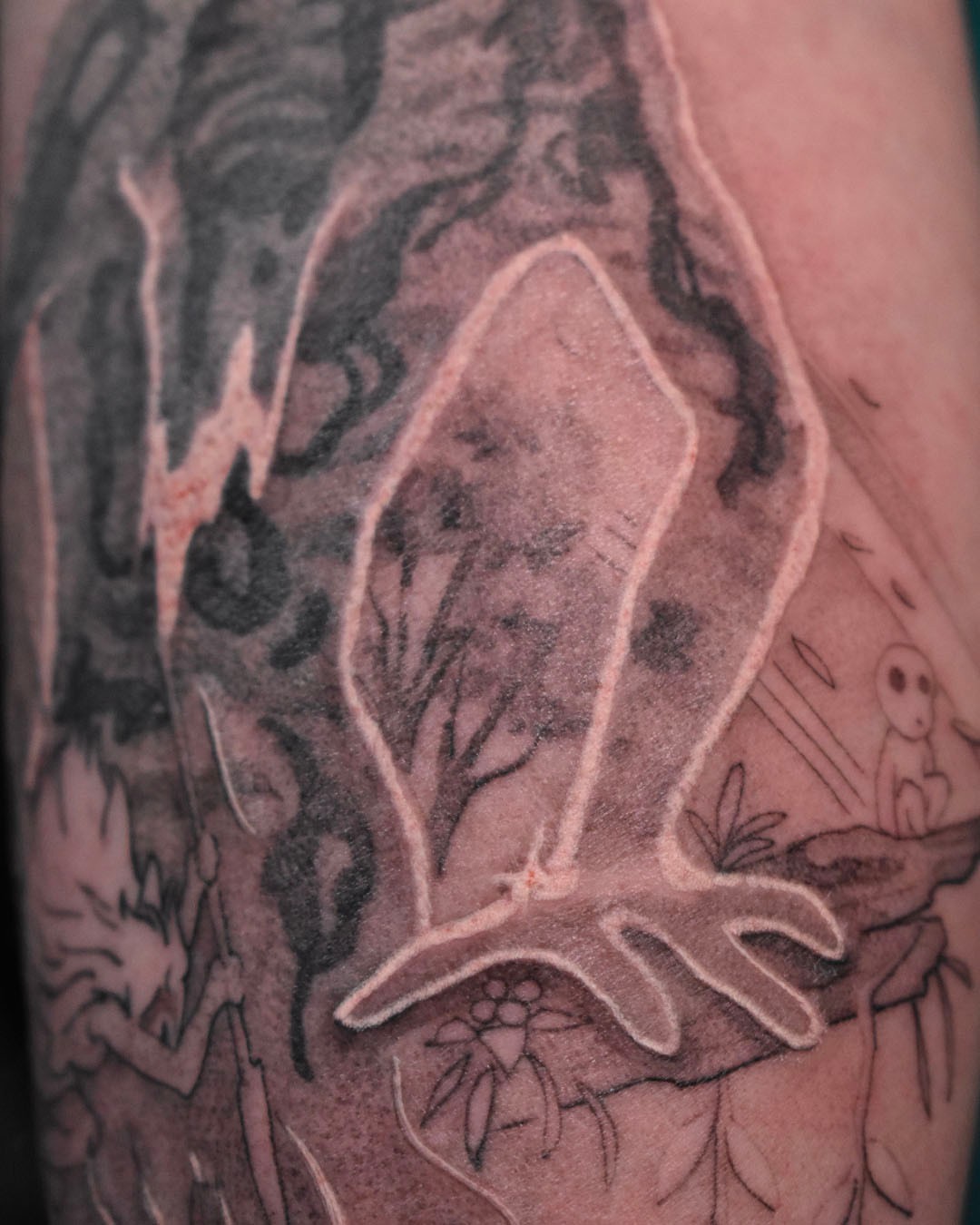 Bird black and grey tattoo on the forearm by Erin Isaacs