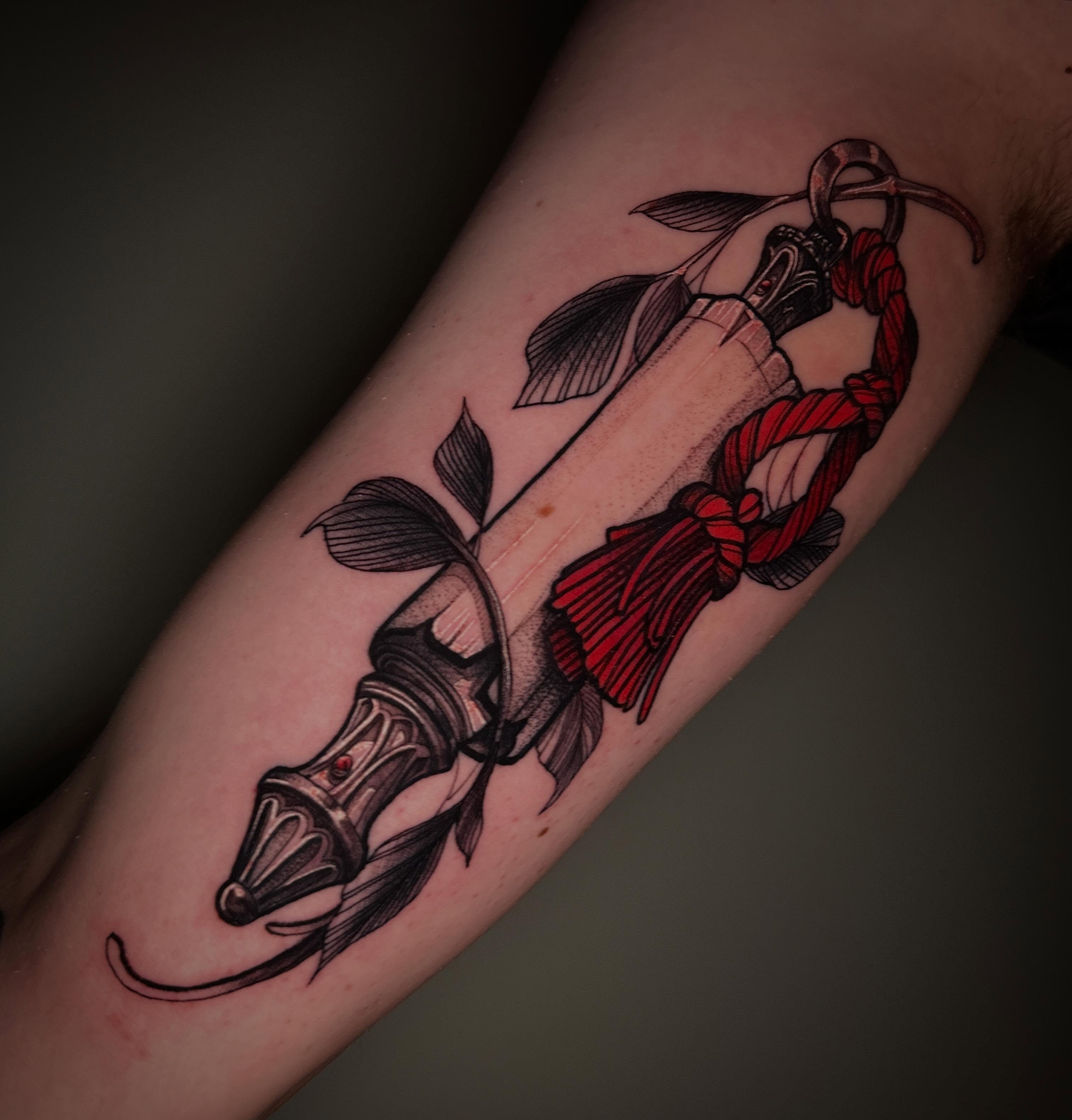 Knife and rope American traditional tattoo on the forearm by Javier Rivera