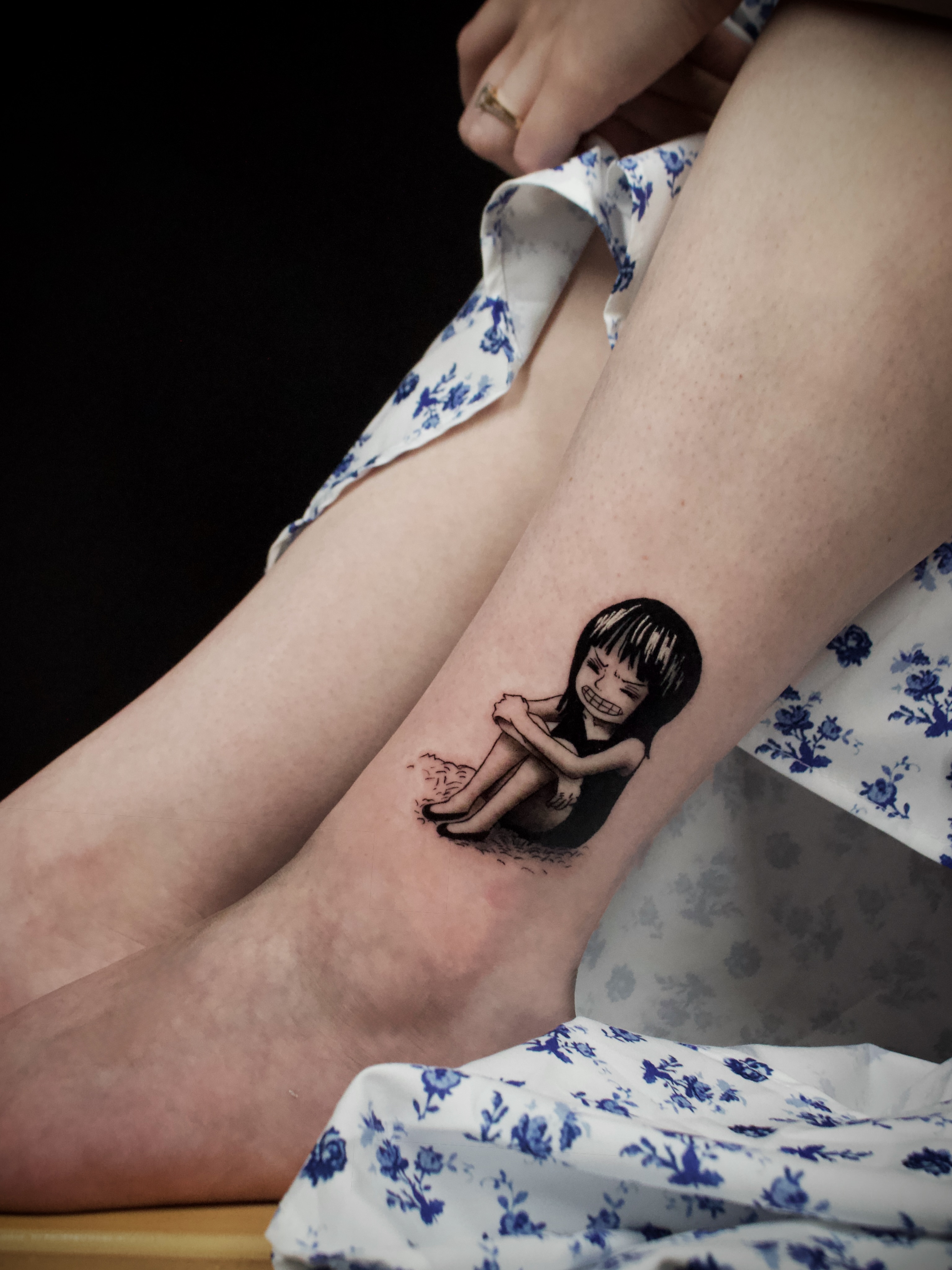 Child black and grey tattoo on the leg by Kanya, Alhambra, California