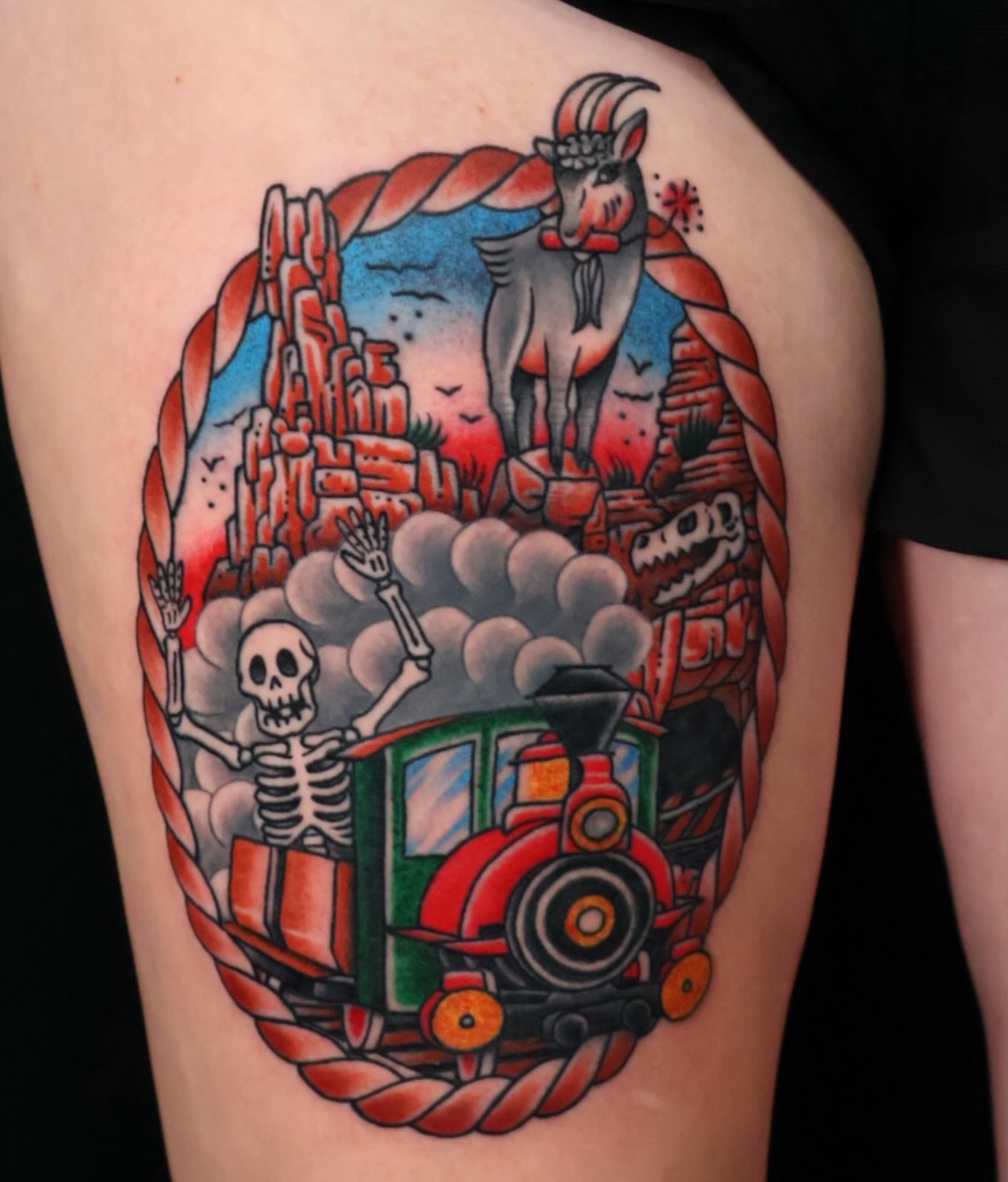 Train and skeleton American traditional tattoo on the thigh by Brandon Bear
