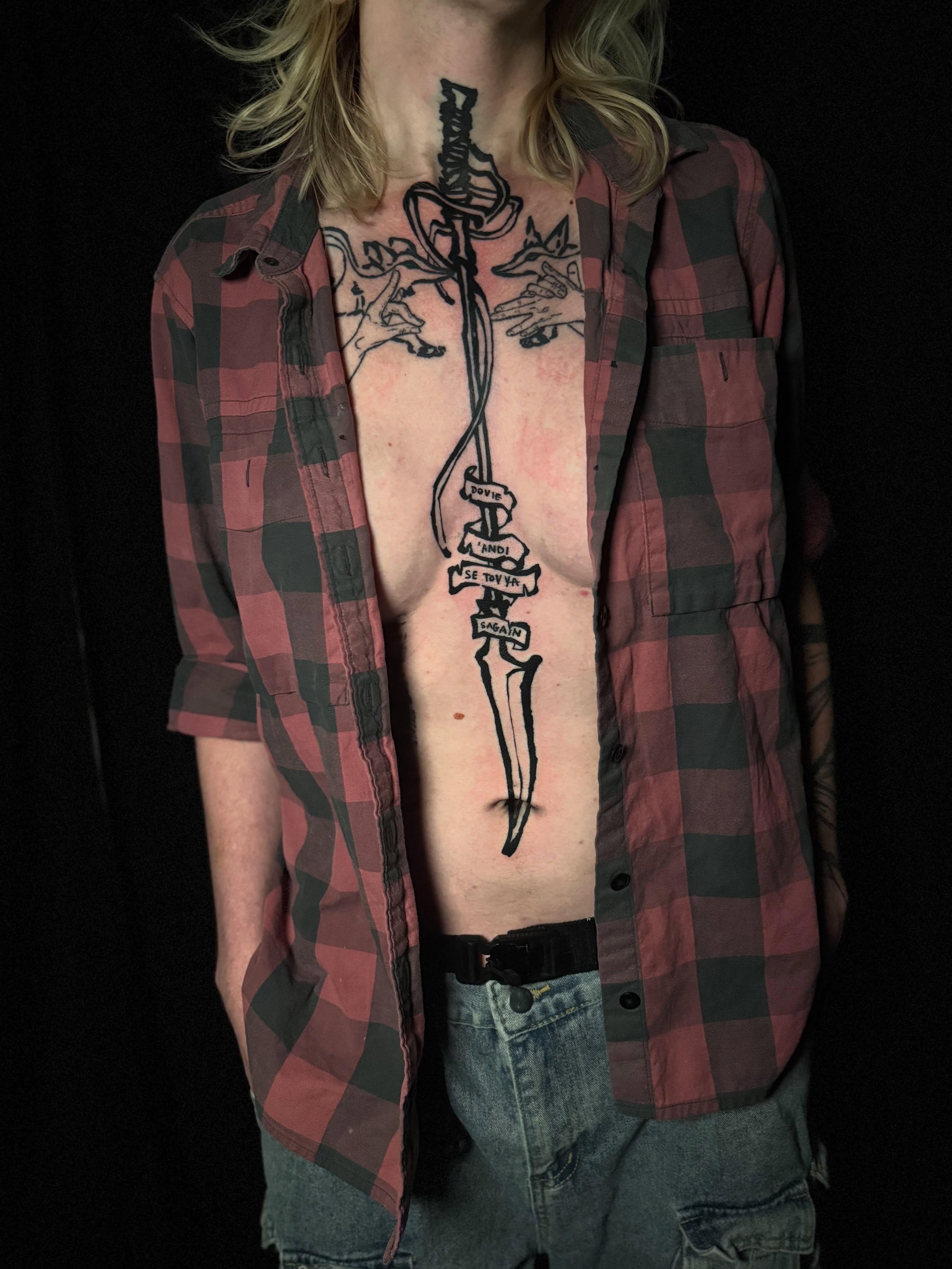 Sword and dagger black and grey tattoo on the chest by z o y a, Seattle, Washington