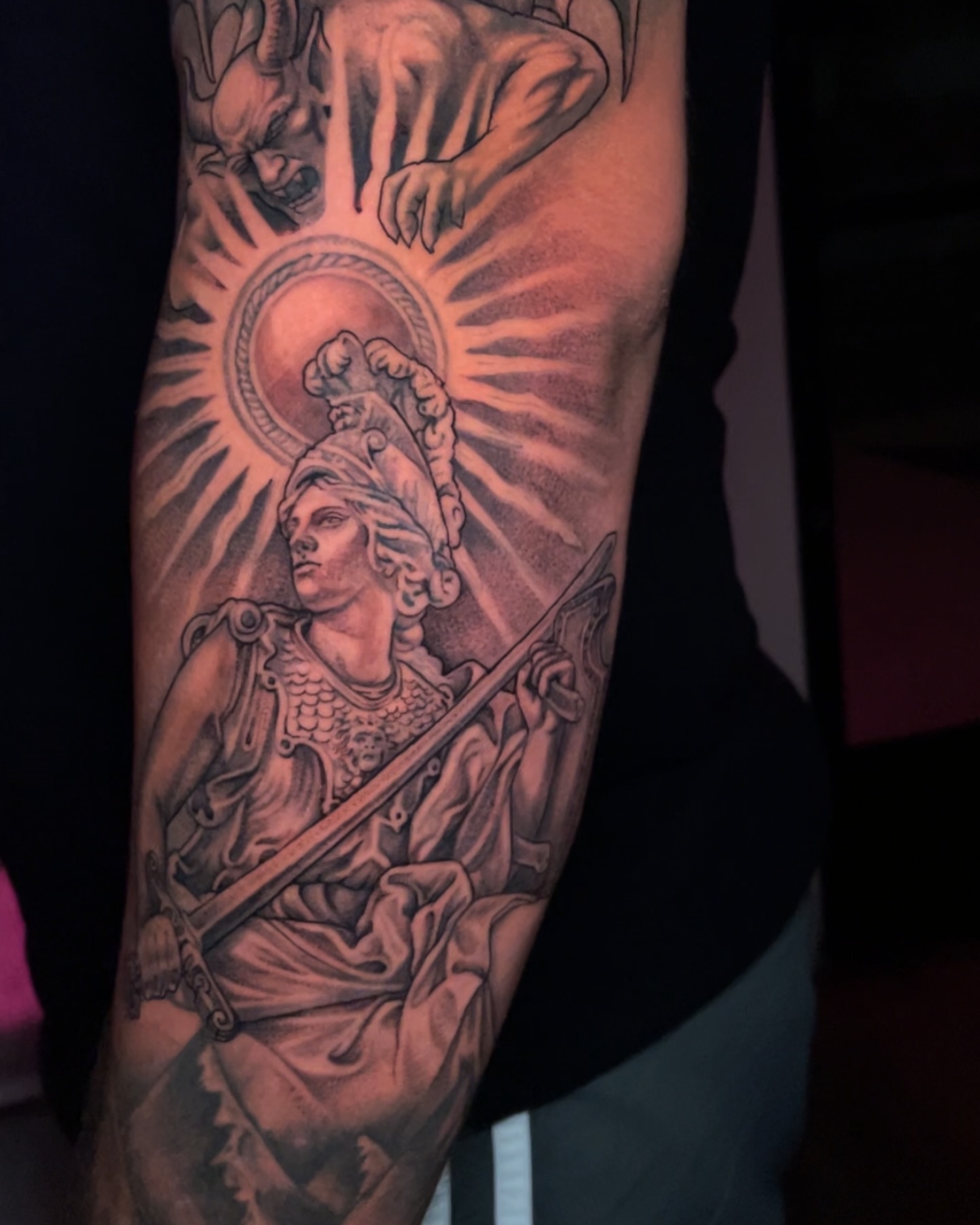 Statue of a warrior realism tattoo on the forearm by Chato