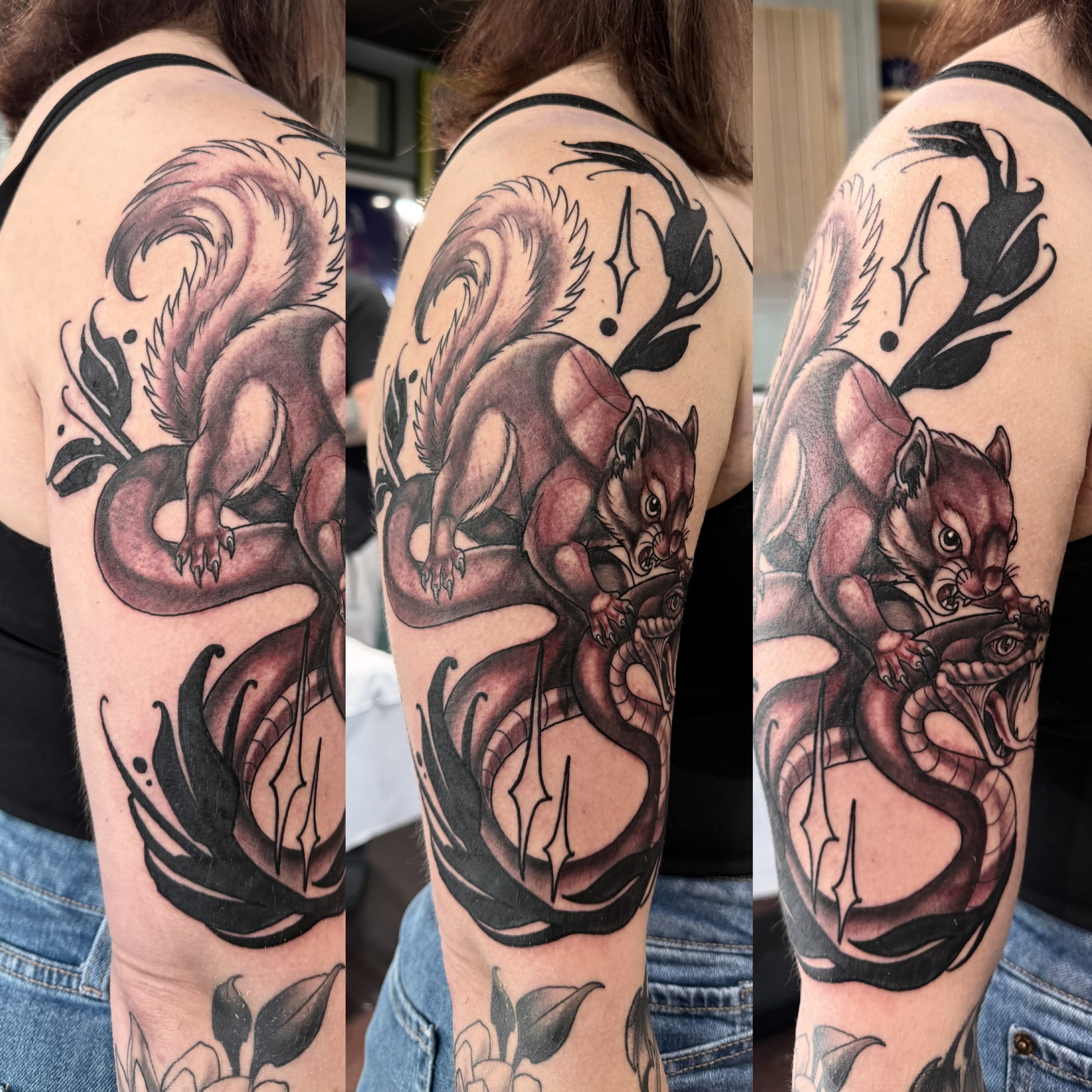 Squirrel and snake American traditional tattoo on the upper arm by Cory Haberman