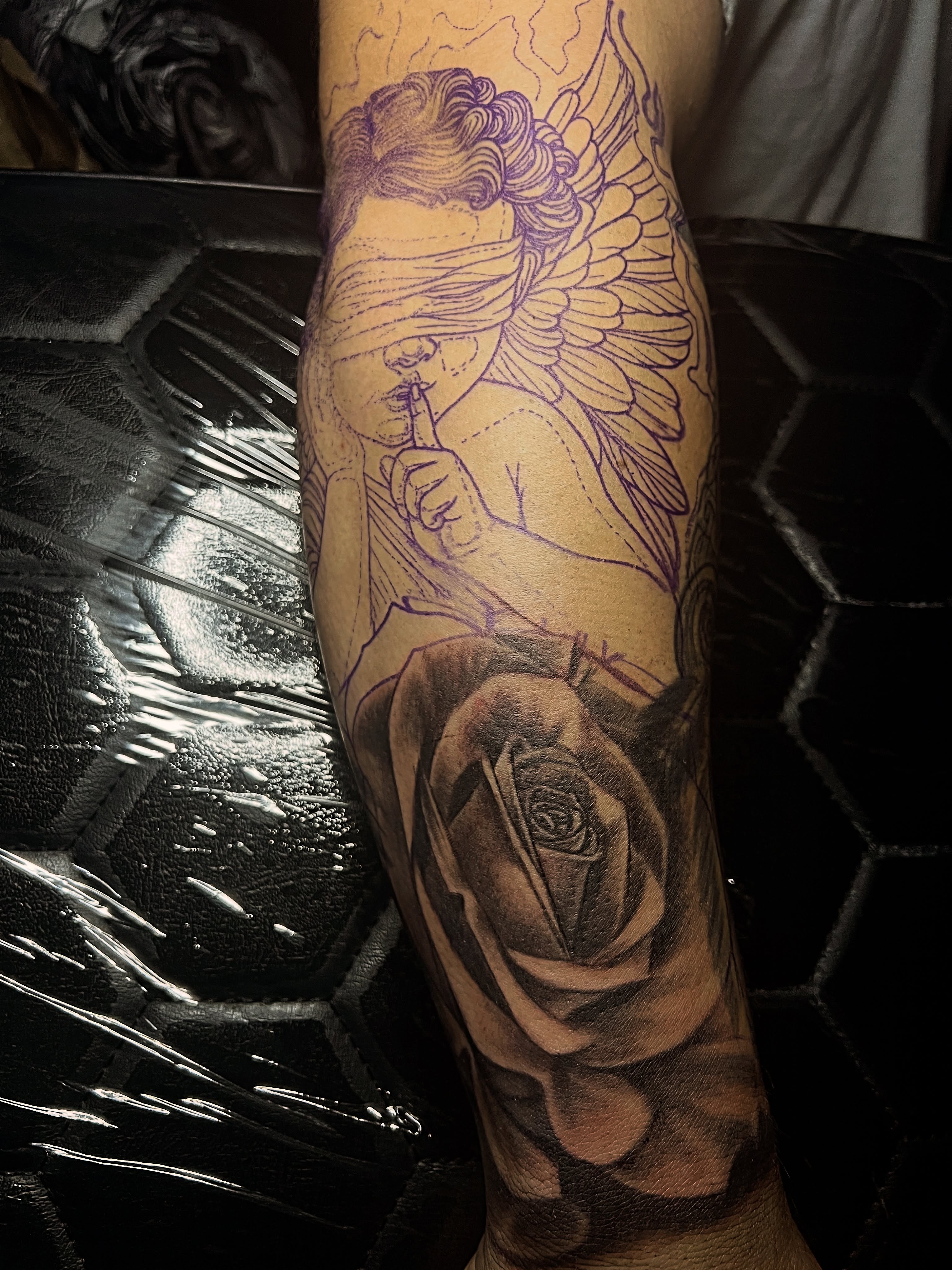 Angel with blindfold black and grey tattoo on the forearm by Monstro Ink Arts Tattoos, Bakersfield, California