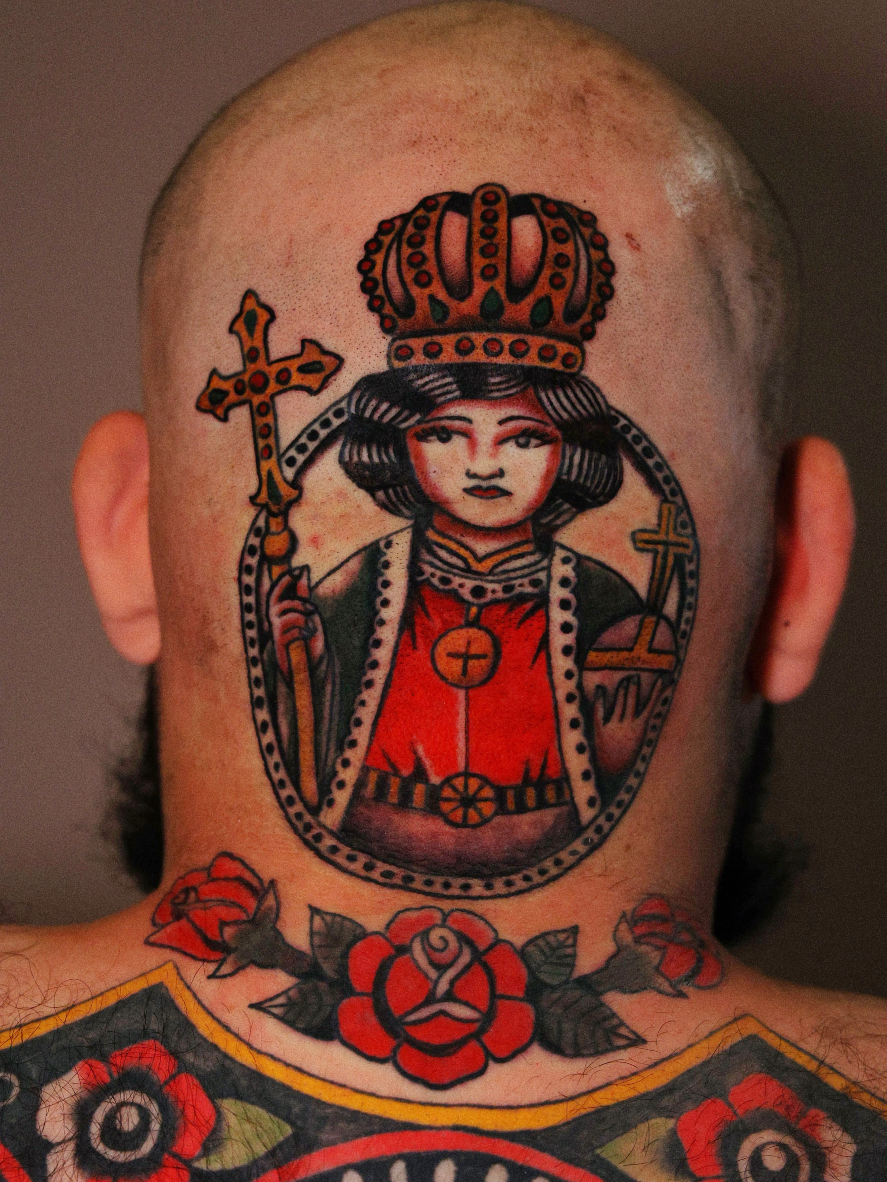 Religious figure American traditional tattoo on the neck by Dylan Mott