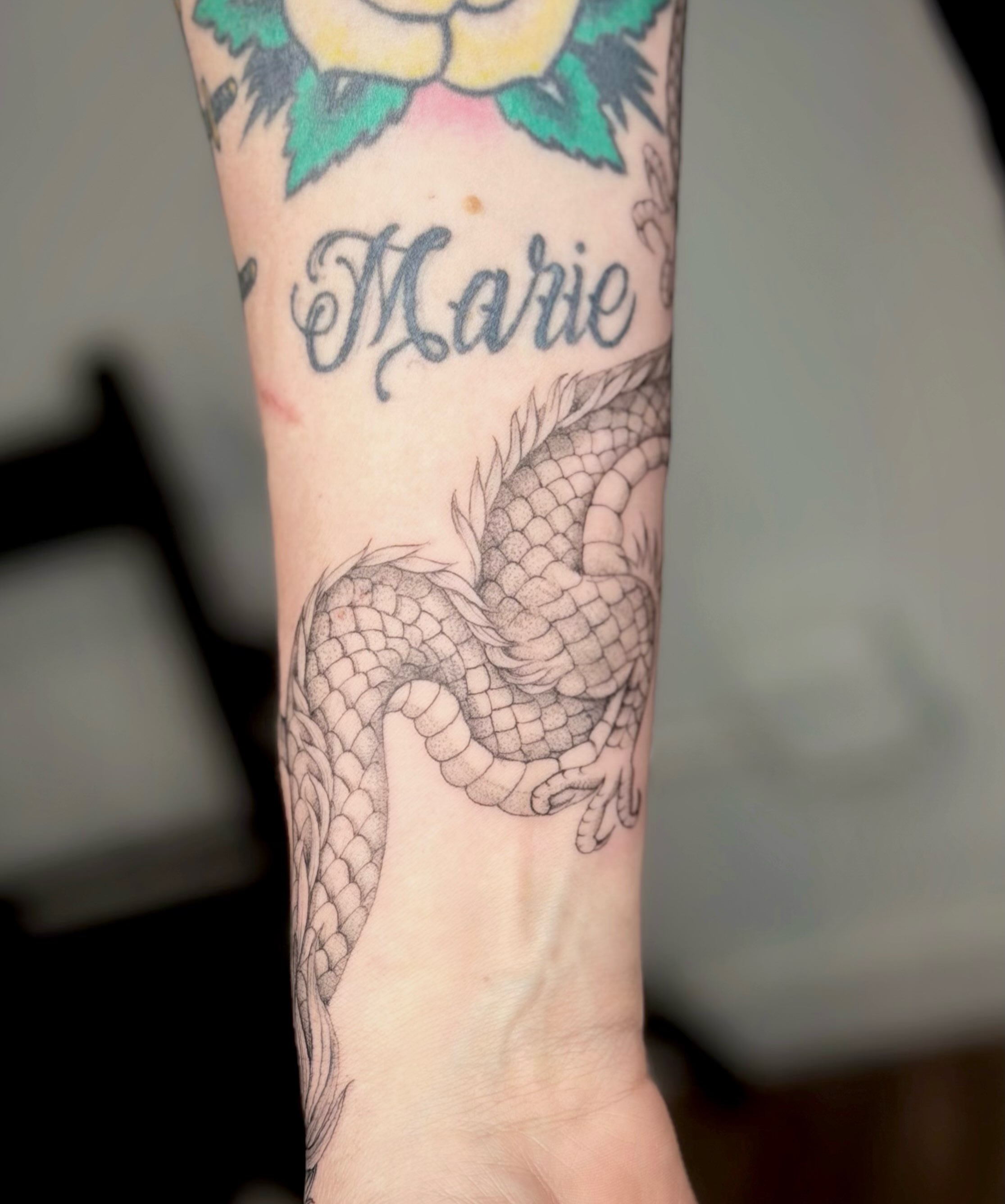 Dragon black and grey tattoo on the forearm by Seattle tattoo artist-Mia