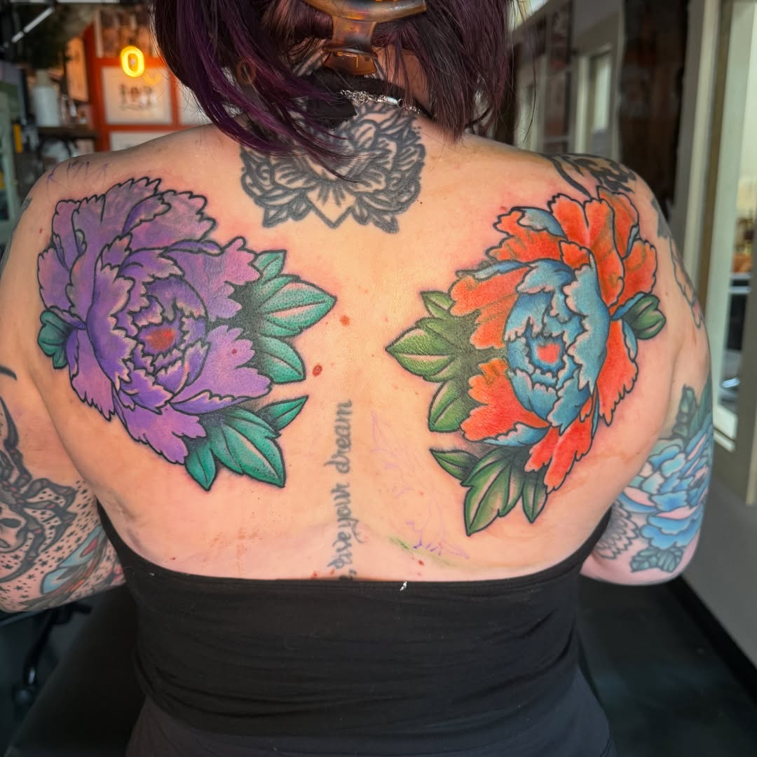 Peony flowers American traditional tattoo on the back by Arron Albaugh