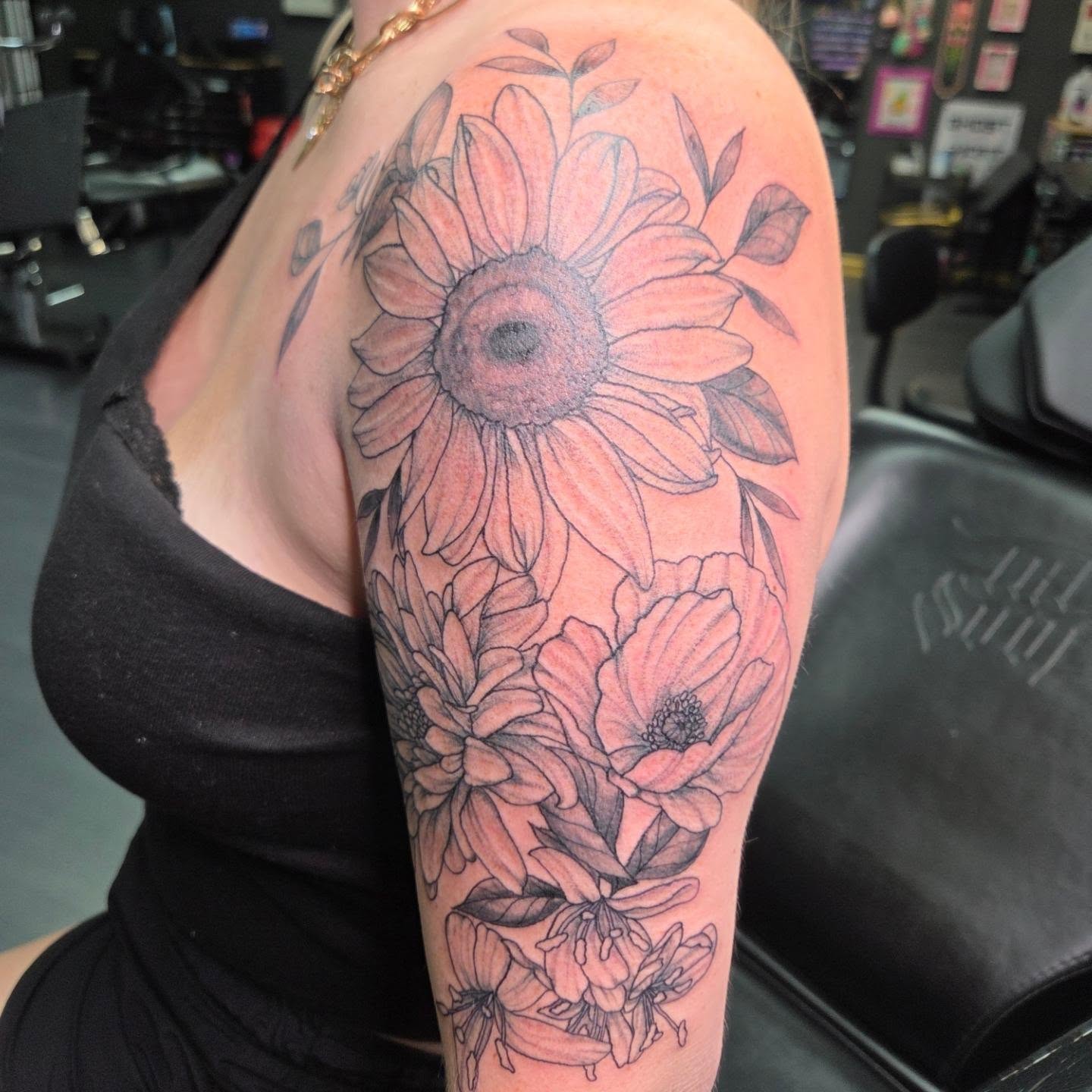 Sunflower bouquet realism tattoo by Trinity Renee