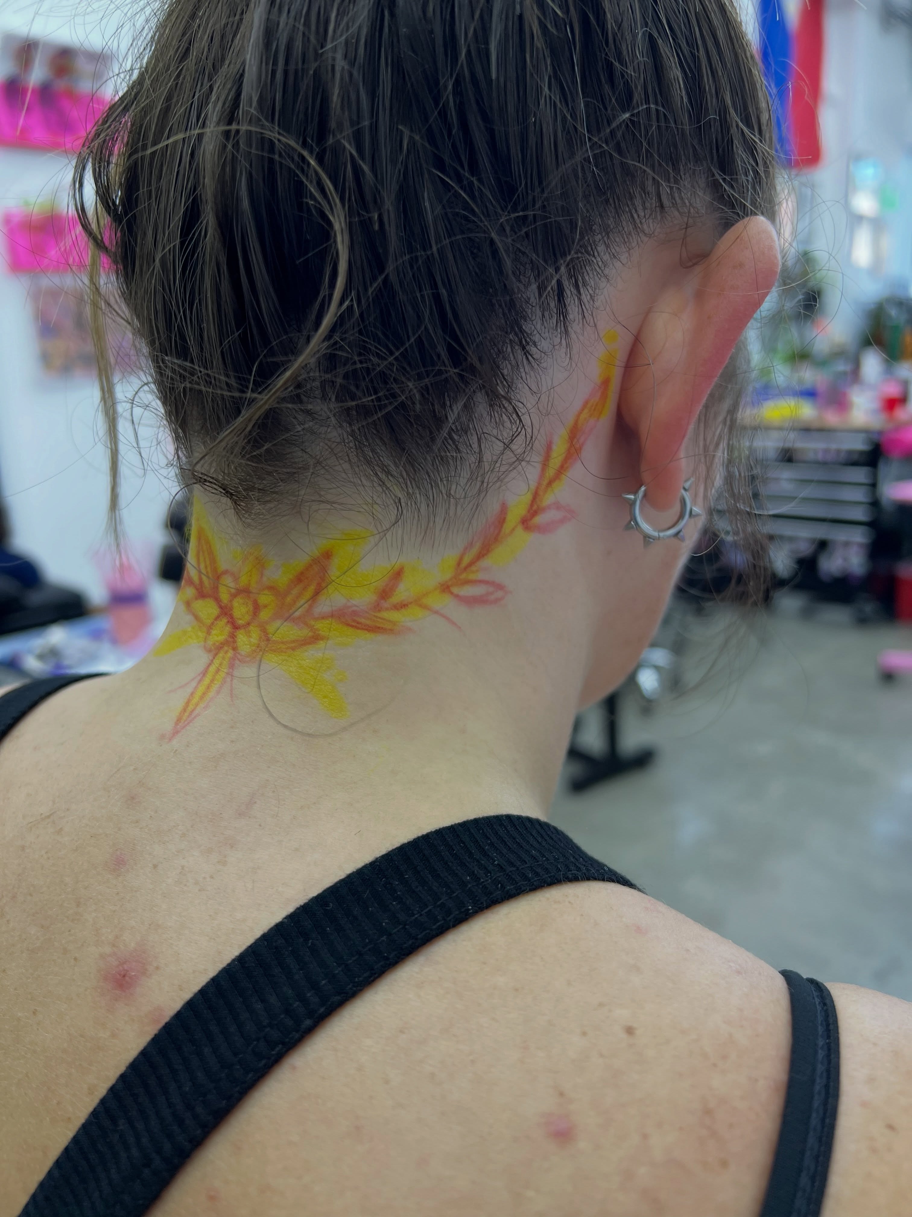 Floral design dotwork tattoo on the neck by Nate Webb