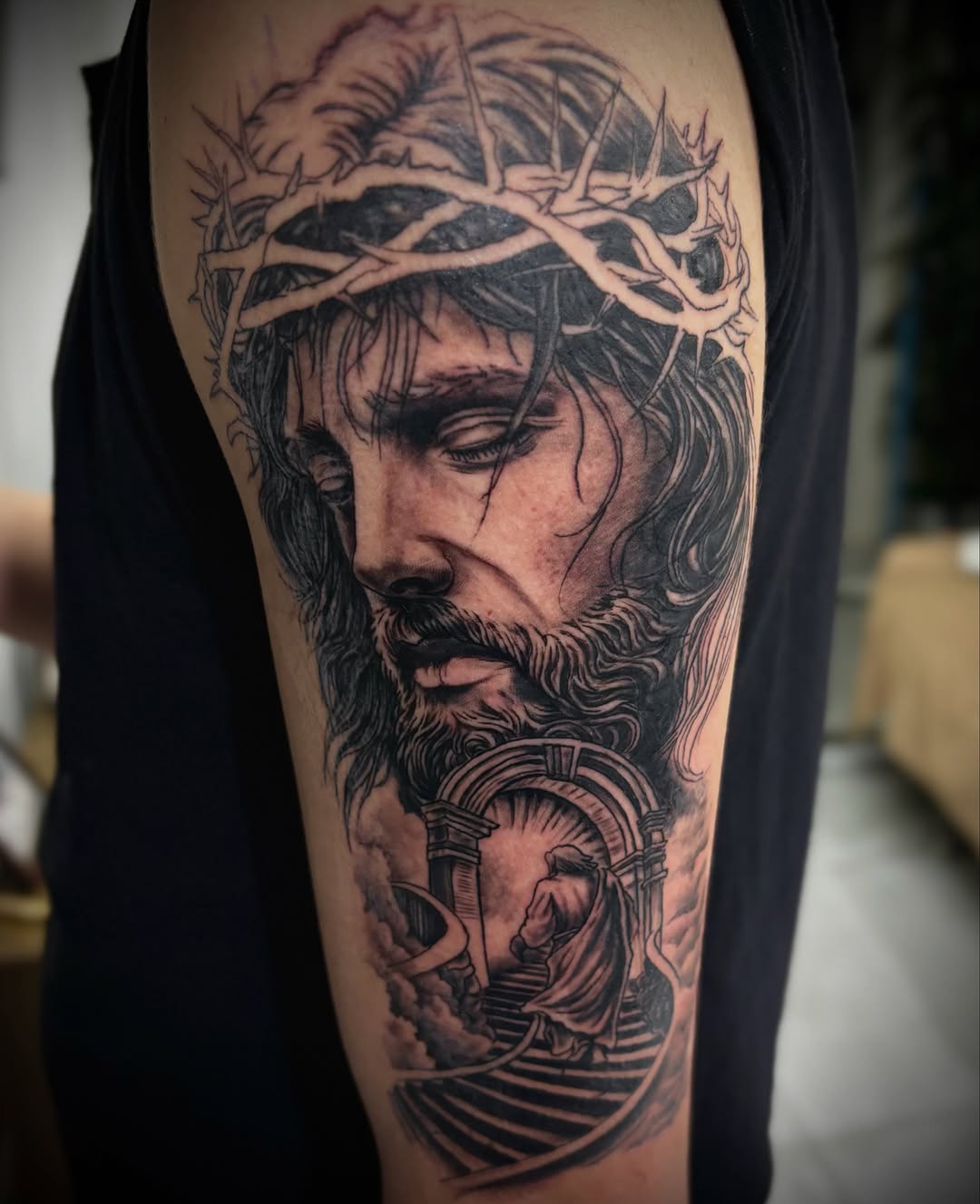Jesus christ and crown of thorns realism tattoo on the forearm by Mauricio gois