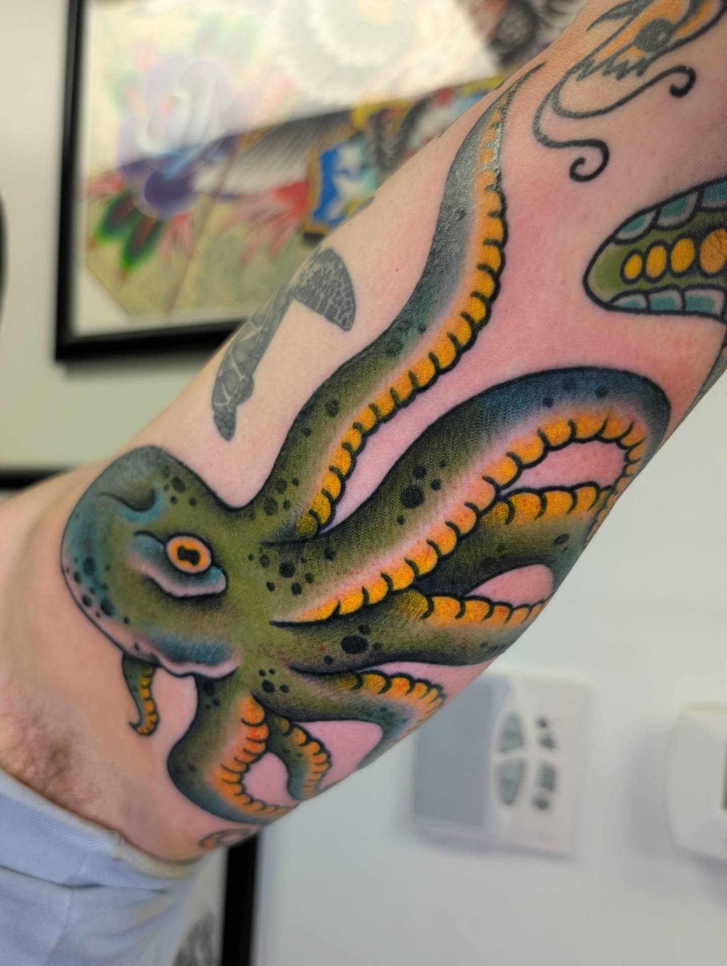 Octopus American traditional tattoo on the forearm by Erik O'Steen, Medford, Massachusetts