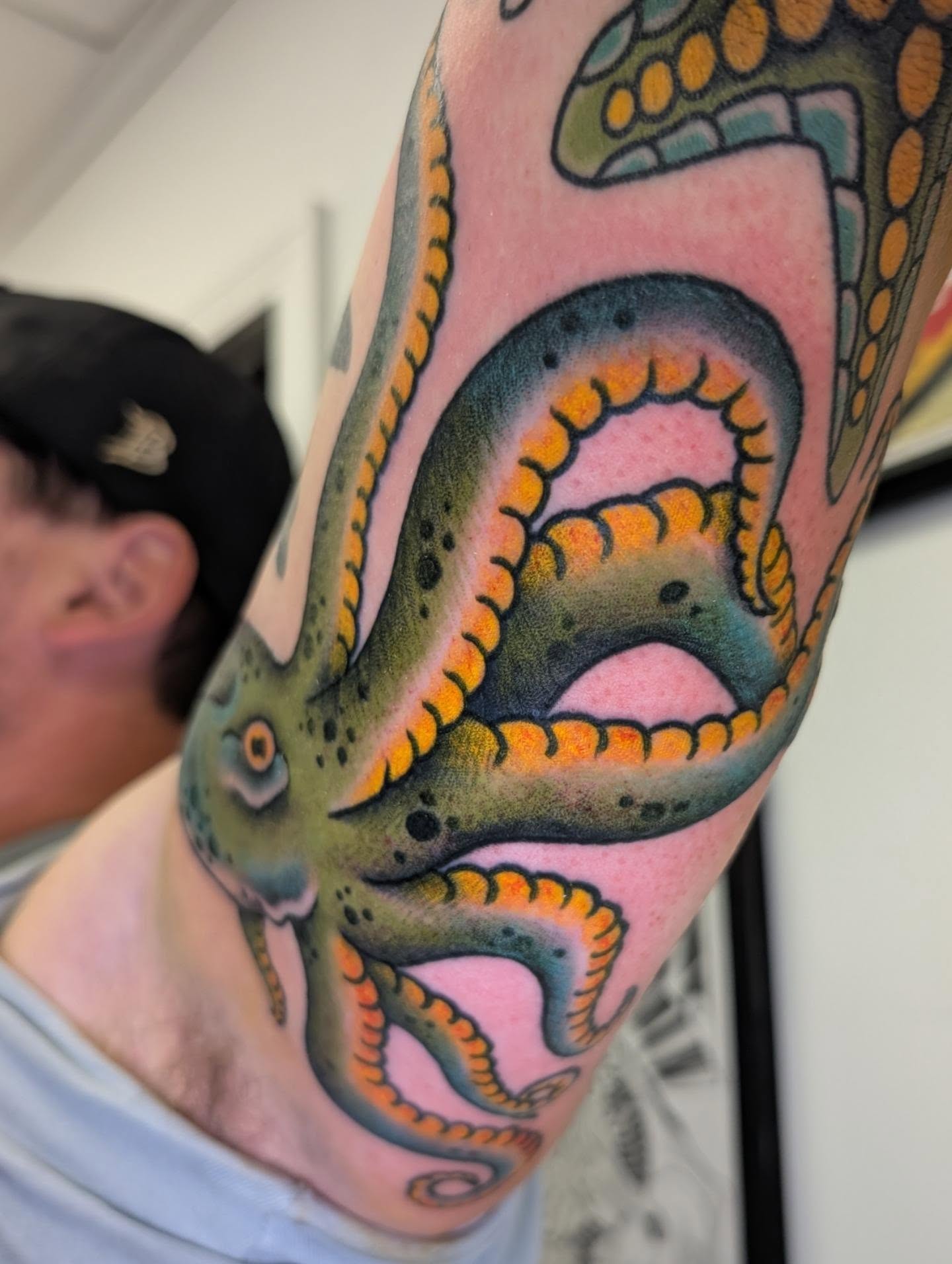Octopus American traditional tattoo on the forearm by Erik O'Steen, Medford, Massachusetts