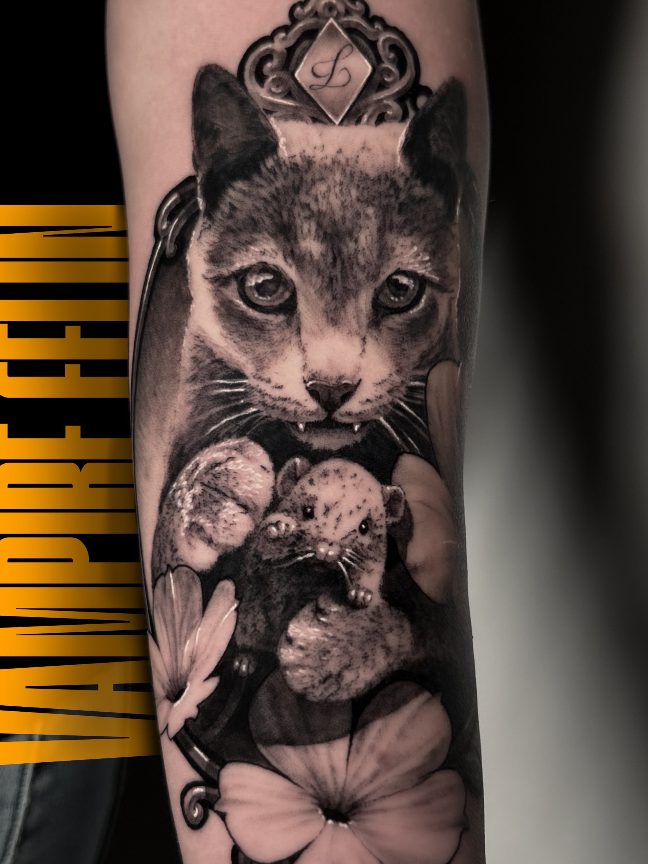 Cat and mice realism tattoo on the forearm by Eltche Art Tattoo