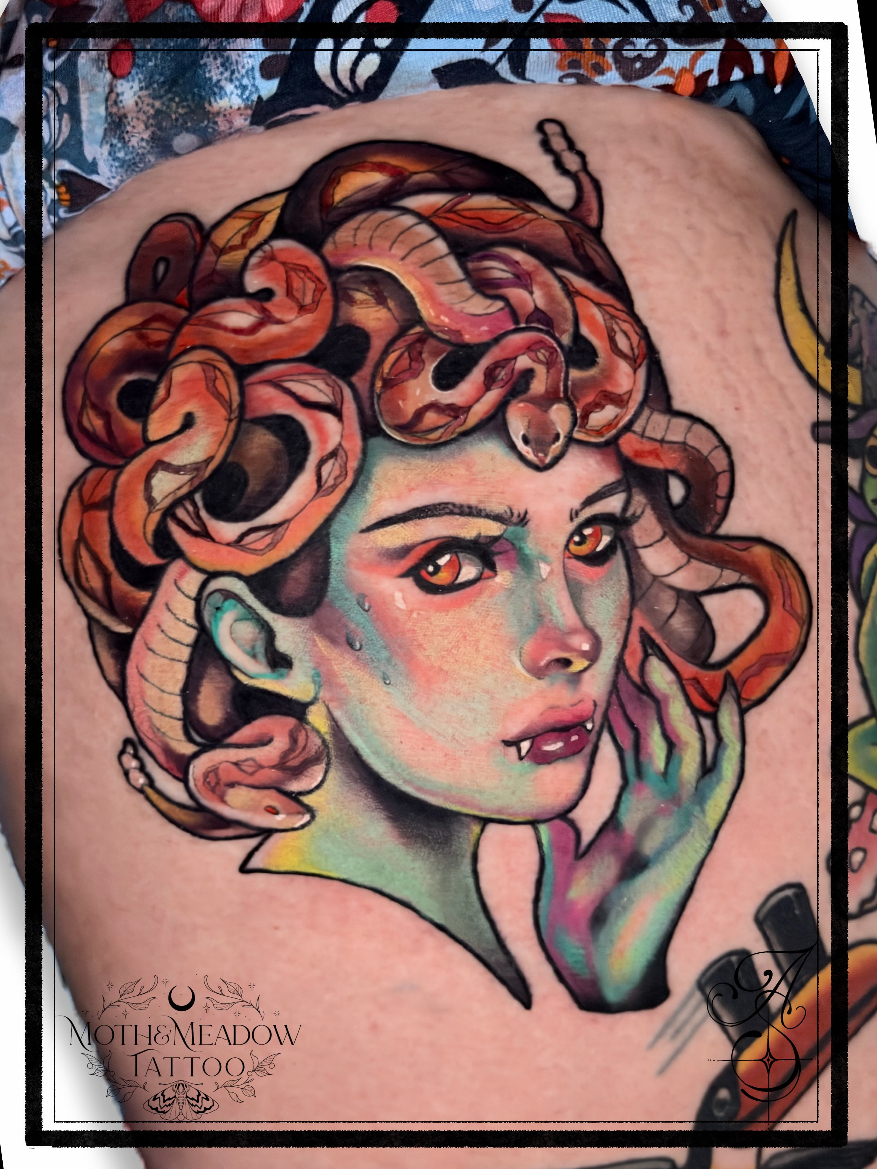 Medusa American traditional tattoo on the torso by Ash Sansoucie