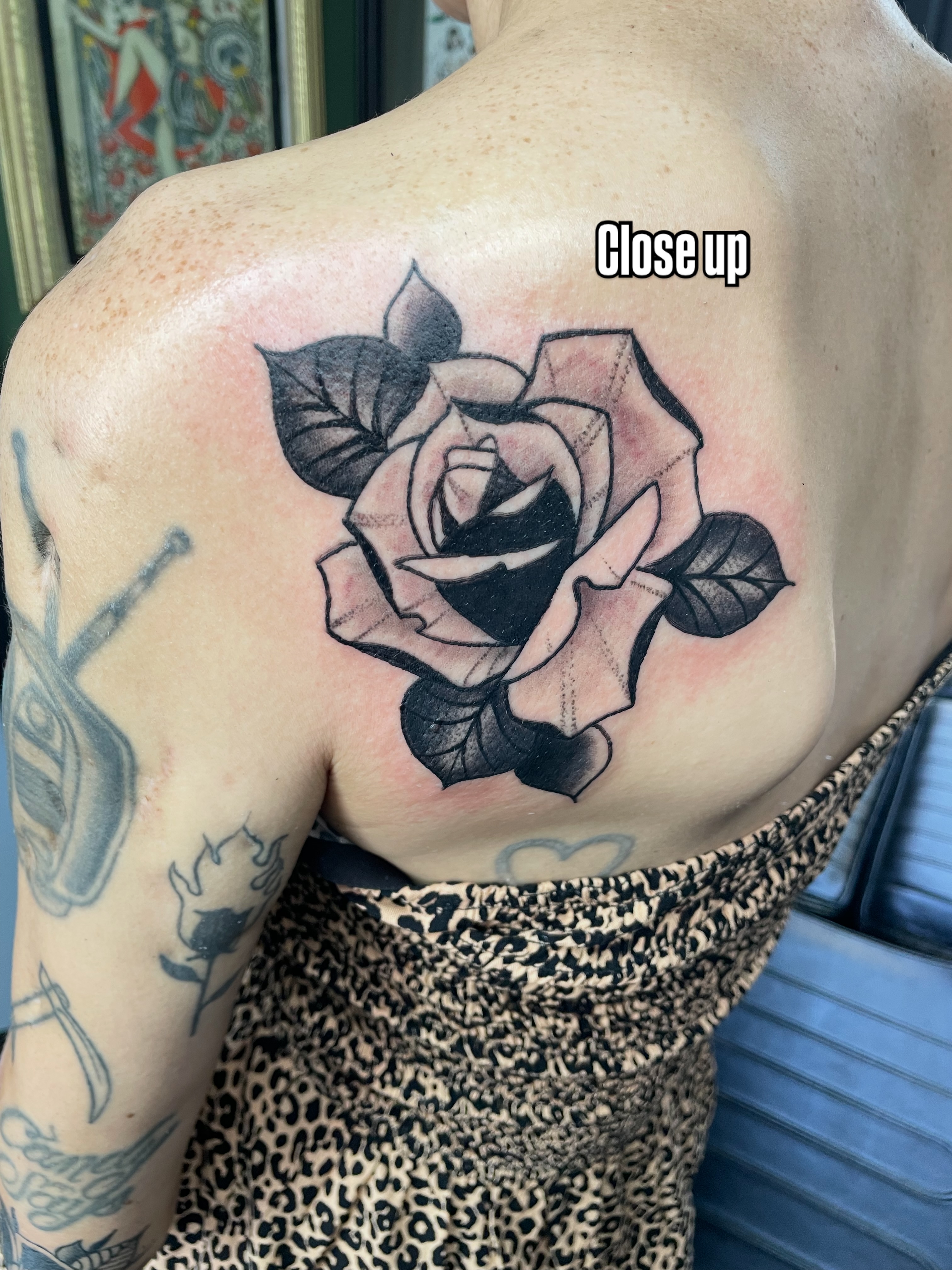 Rose black and grey tattoo on the back by San Diego Tattoo Artist