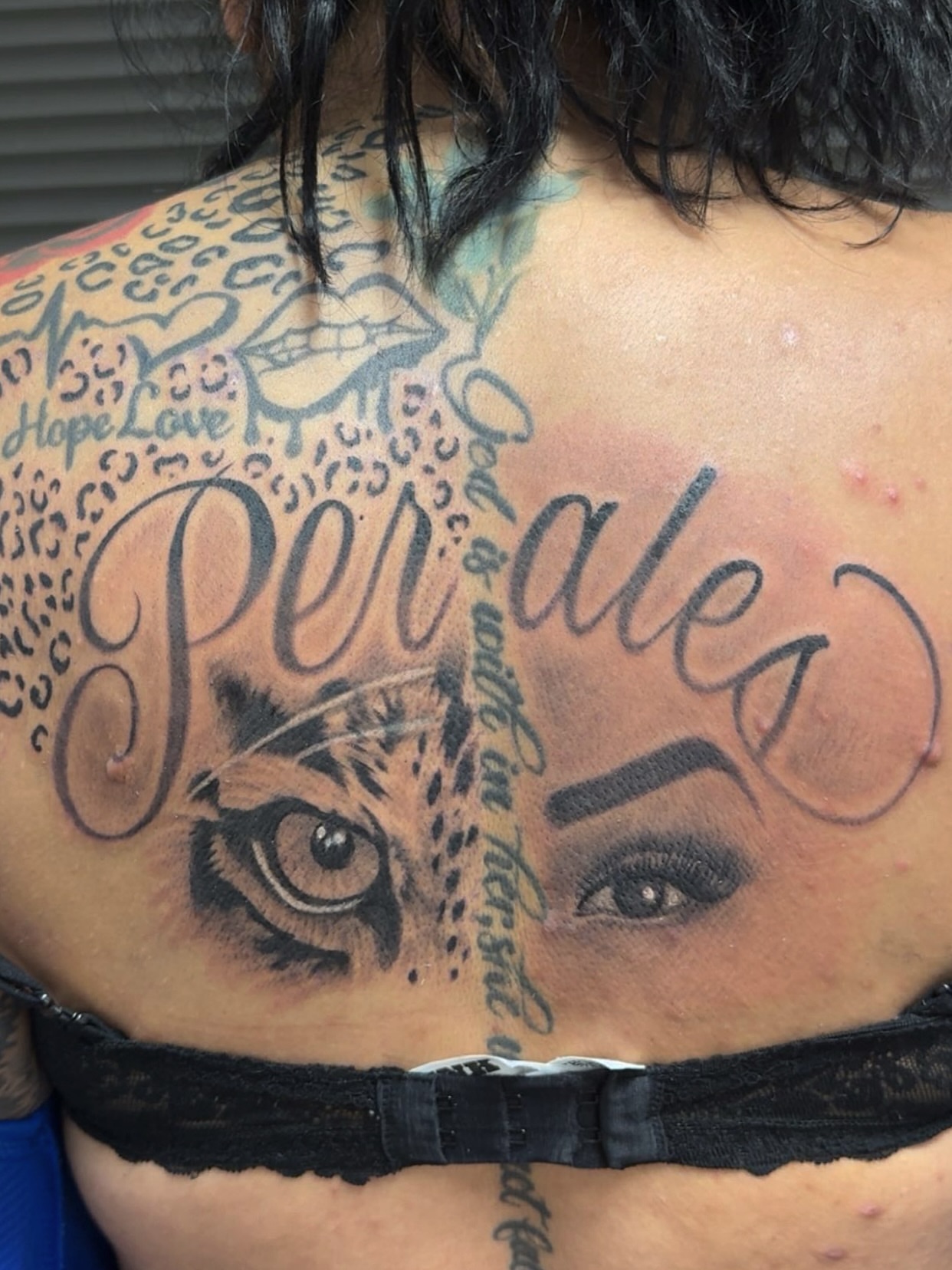 Portrait realism tattoo on the back by Royal Martinez