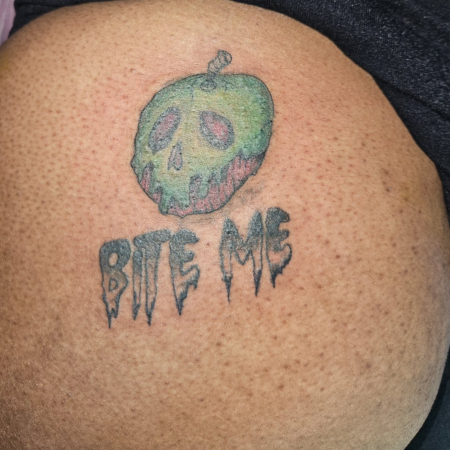 Poison apple dotwork tattoo on the back by Mischief π€