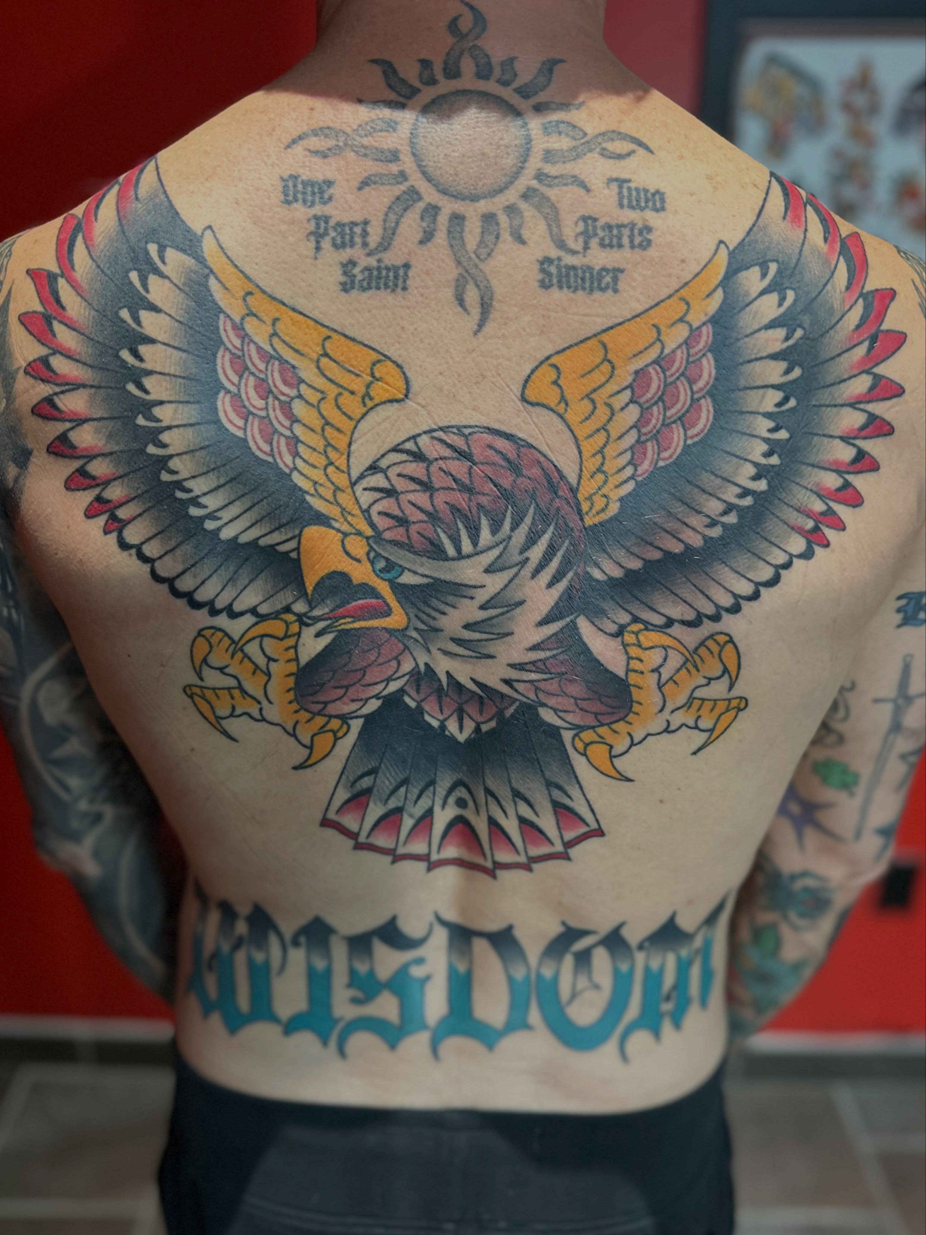 Eagle American traditional tattoo on the back by Walk-in American Traditional Tattoos Las