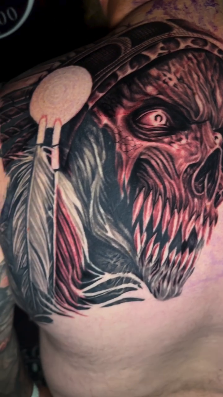 Skull with headdress dark realism tattoo by InkFloyd Roith