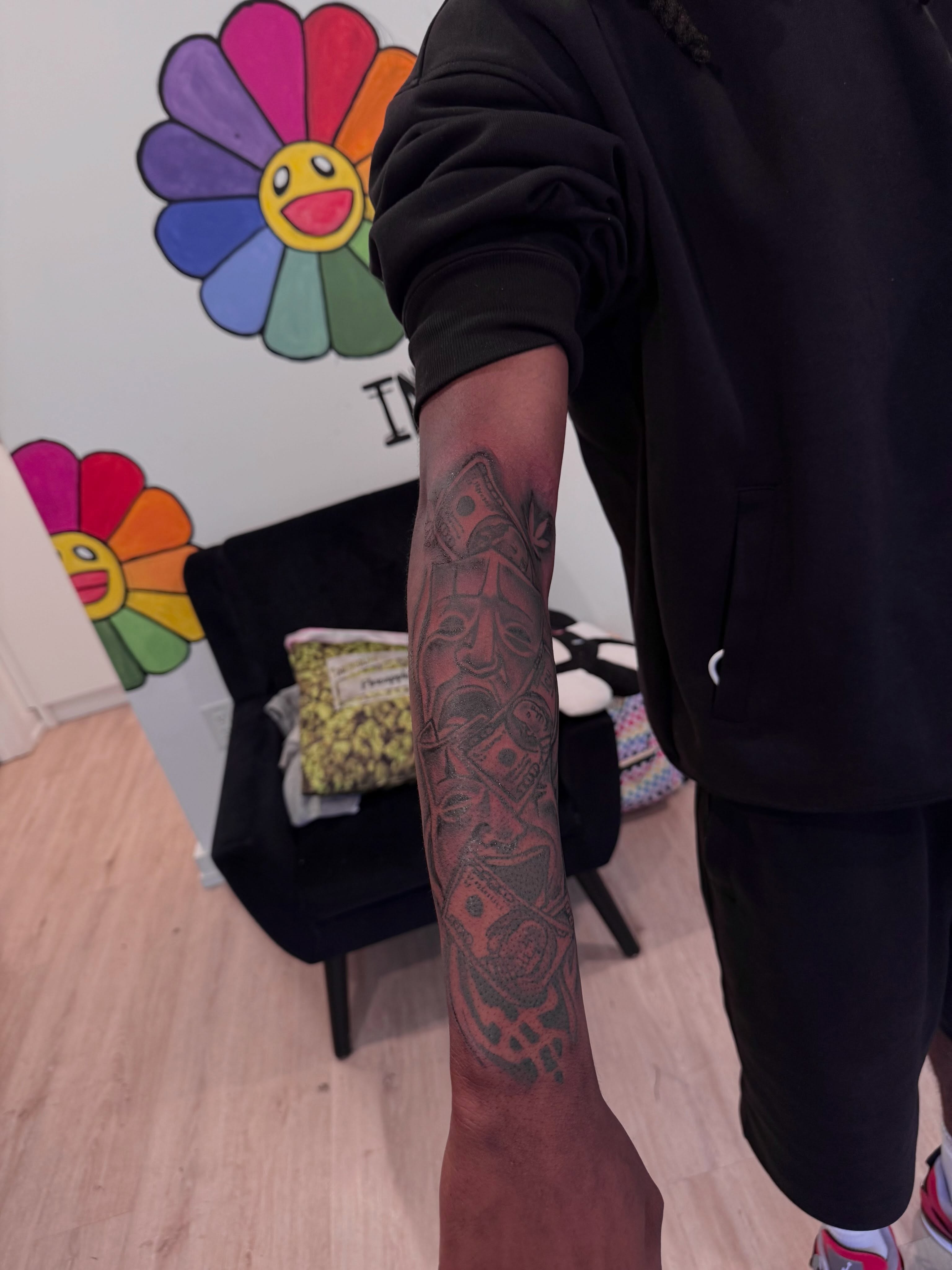 Mask black and grey tattoo on the forearm by inkedbylii, Philadelphia, Pennsylvania