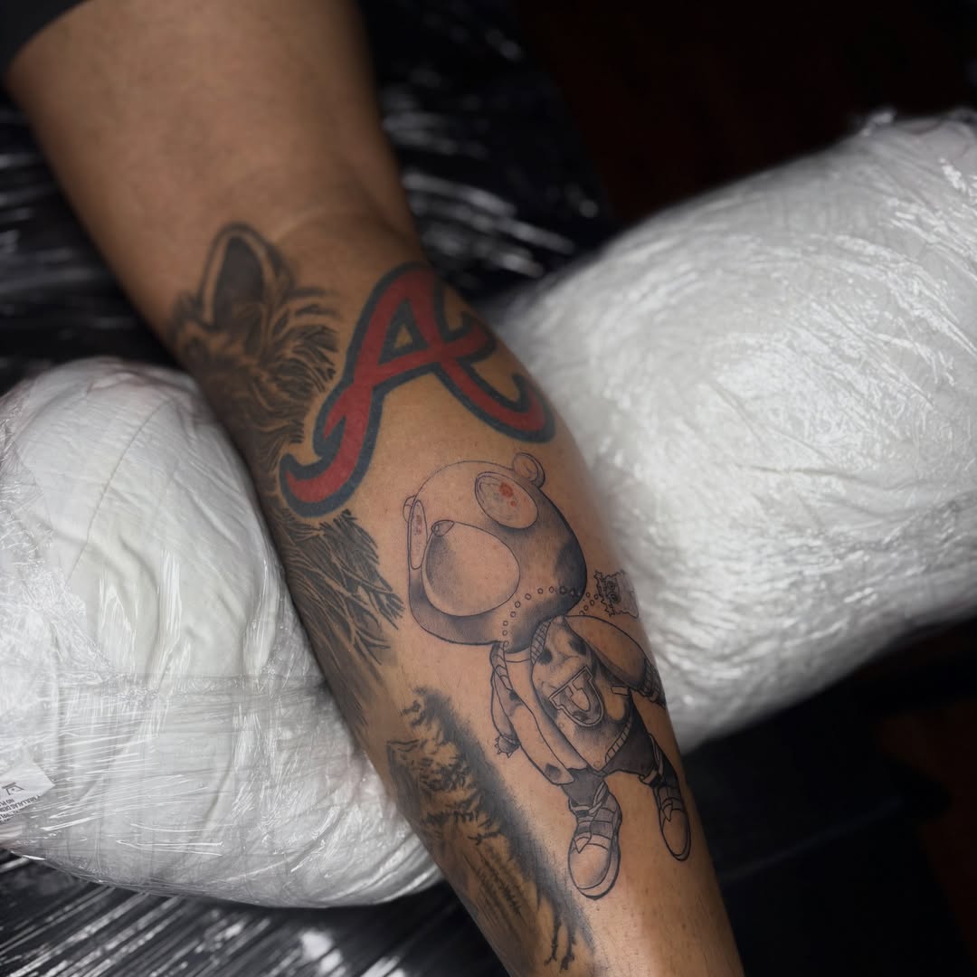 Space bear astronaut realism tattoo on the forearm by Koolz