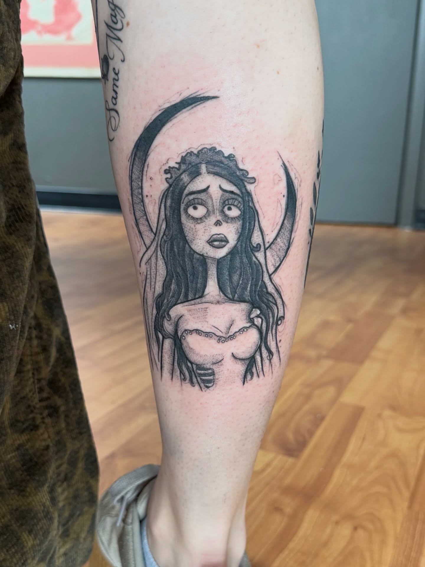 Woman with crescent moon halo realism tattoo on the forearm by Matt Hattaway