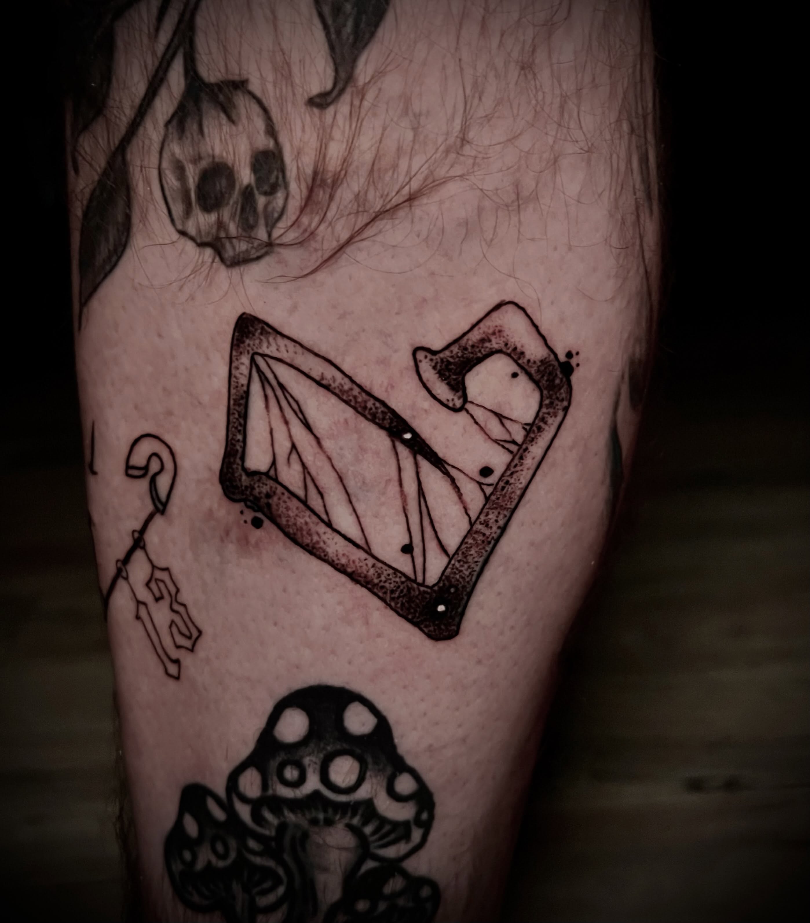 Harp dotwork tattoo on the forearm by James Richardson