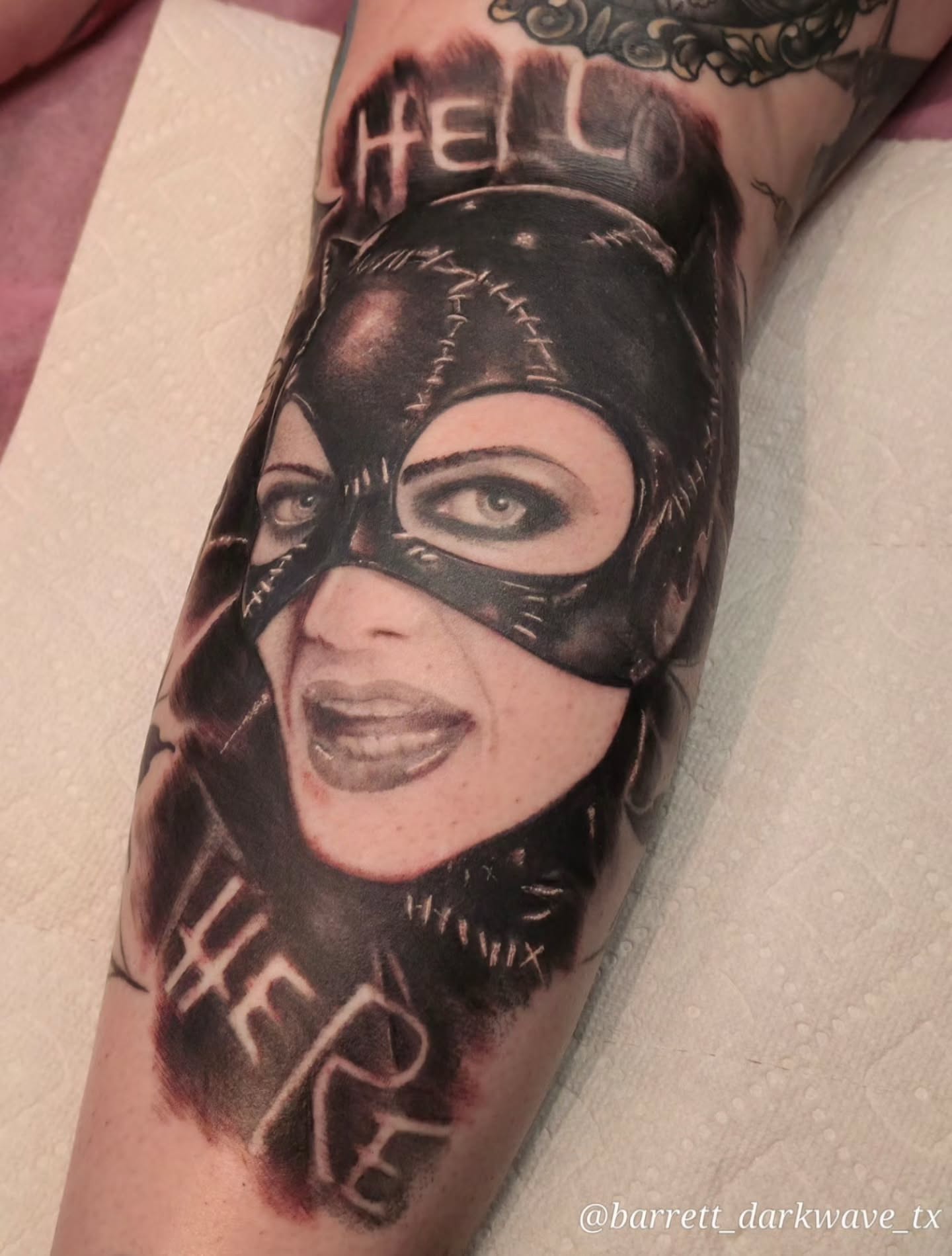Catwoman realism tattoo on the forearm by Barrett Handel