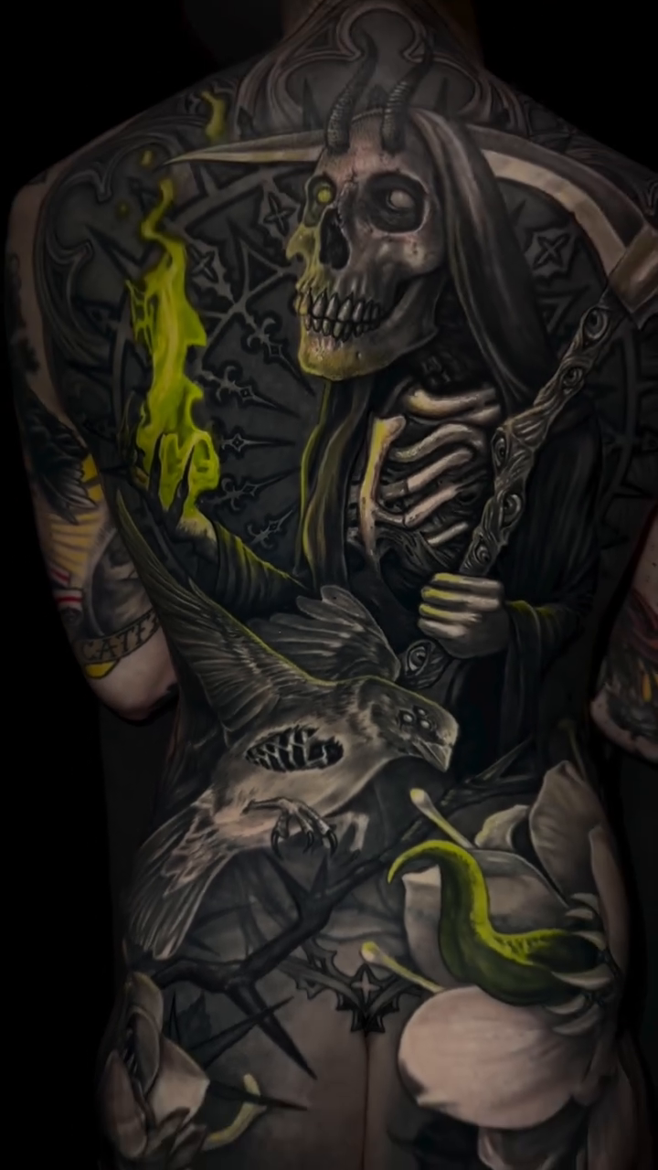 Grim Reaper with scythe and flowers dark realism tattoo by Caitlyn Campbell