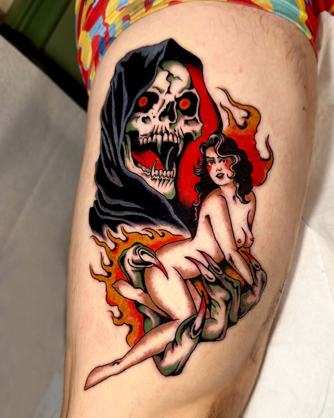 Death and woman American traditional tattoo on the thigh by Haley Tucker, Sebastopol, California