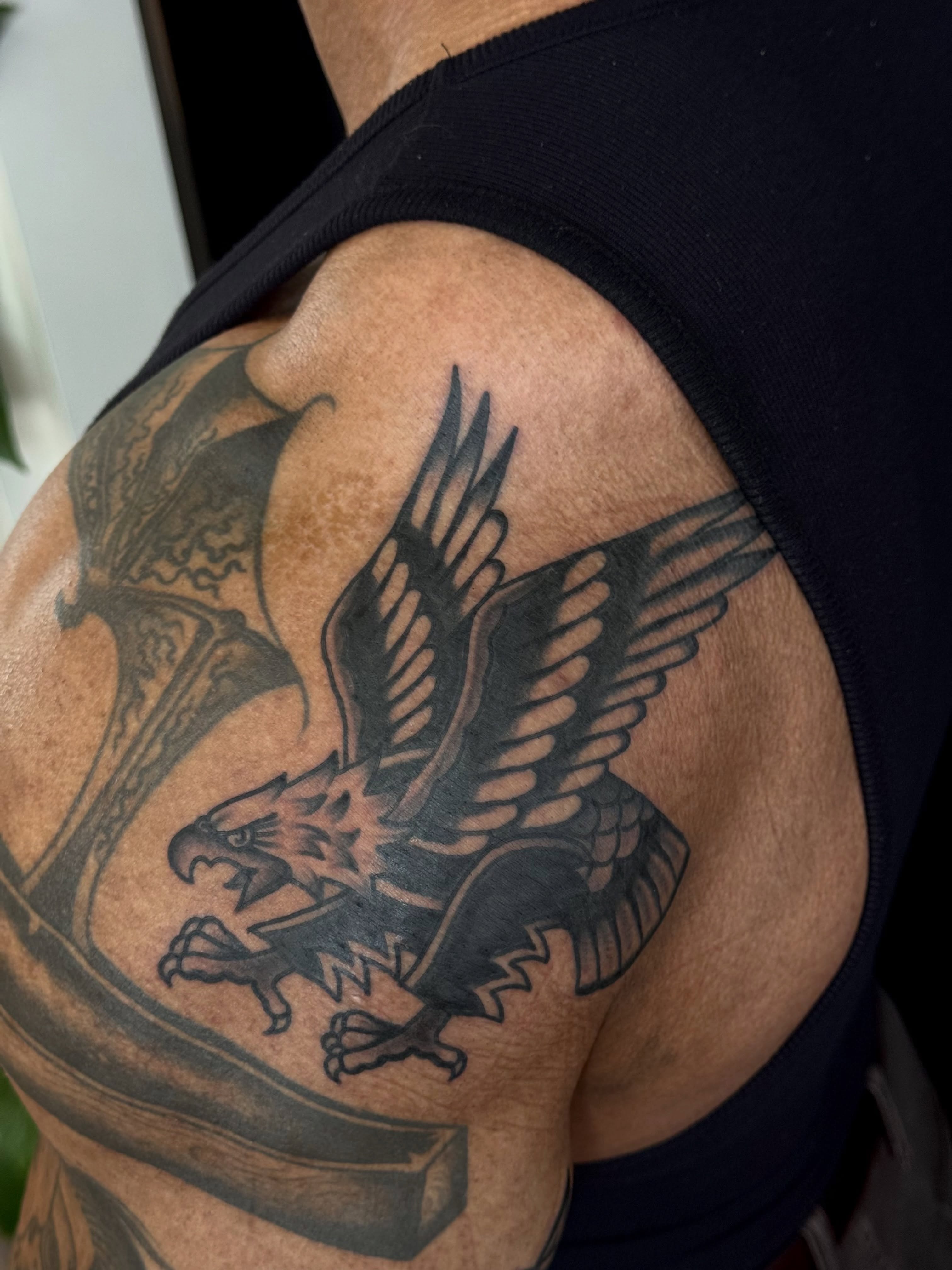 Eagle black and grey tattoo on the shoulder by San Diego Tattoo Artist - 𝔍𝔞𝔠𝔬𝔟 𝔓𝔞𝔫𝔦𝔞𝔤𝔲𝔞