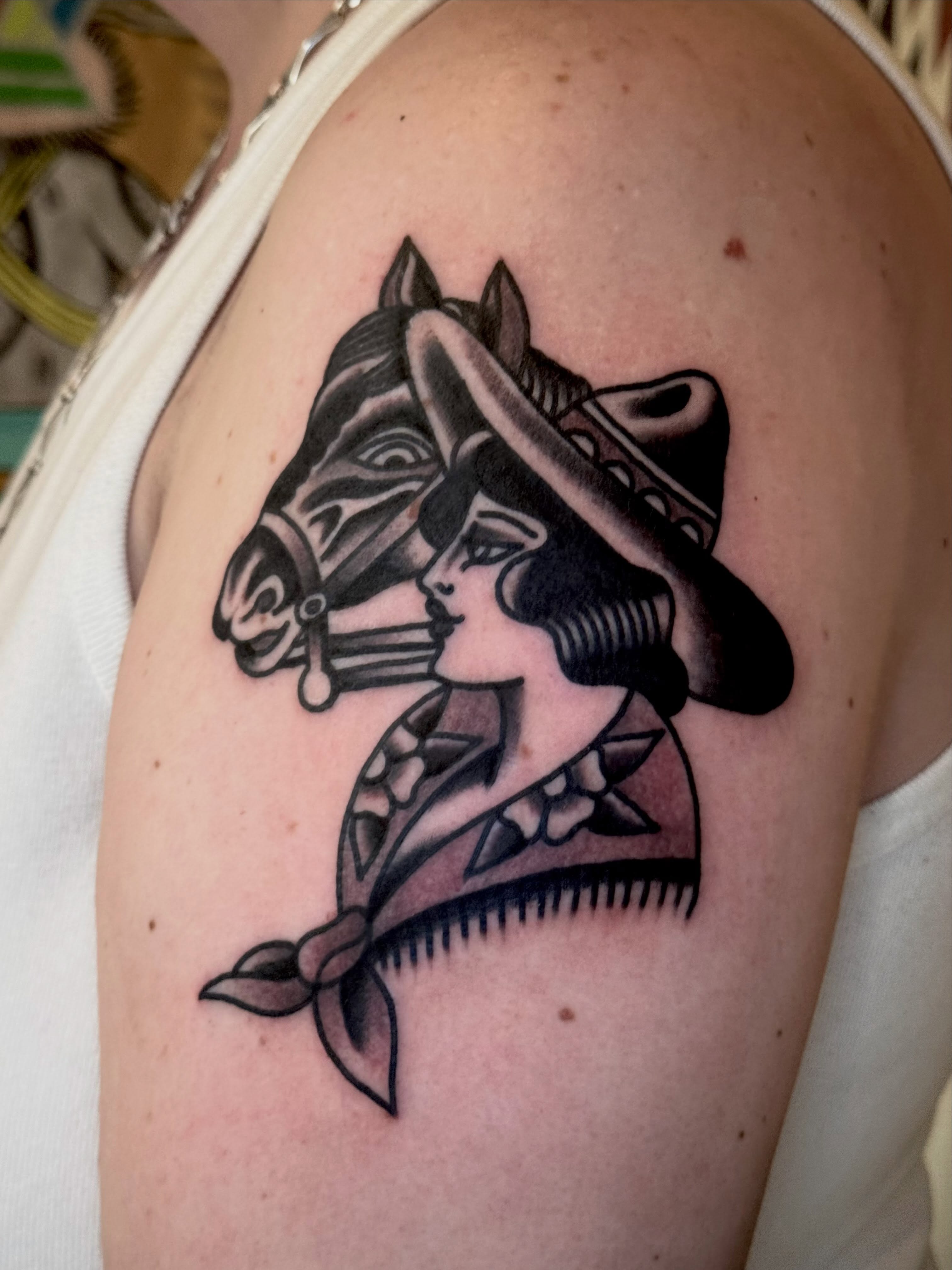 Woman and horse Chicano tattoo on the shoulder by Eli Bernal